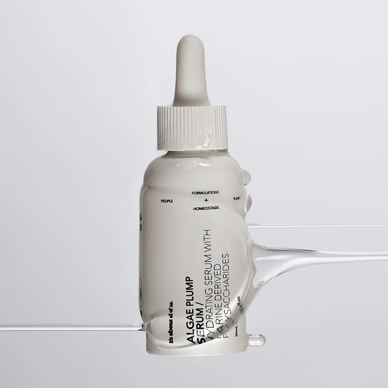Dulcie Algae Plump serum packaged in a white injection-moulded VIVOMER dropper. This showcases the precision engineering required to dispense active skincare serums without multi-material waste.