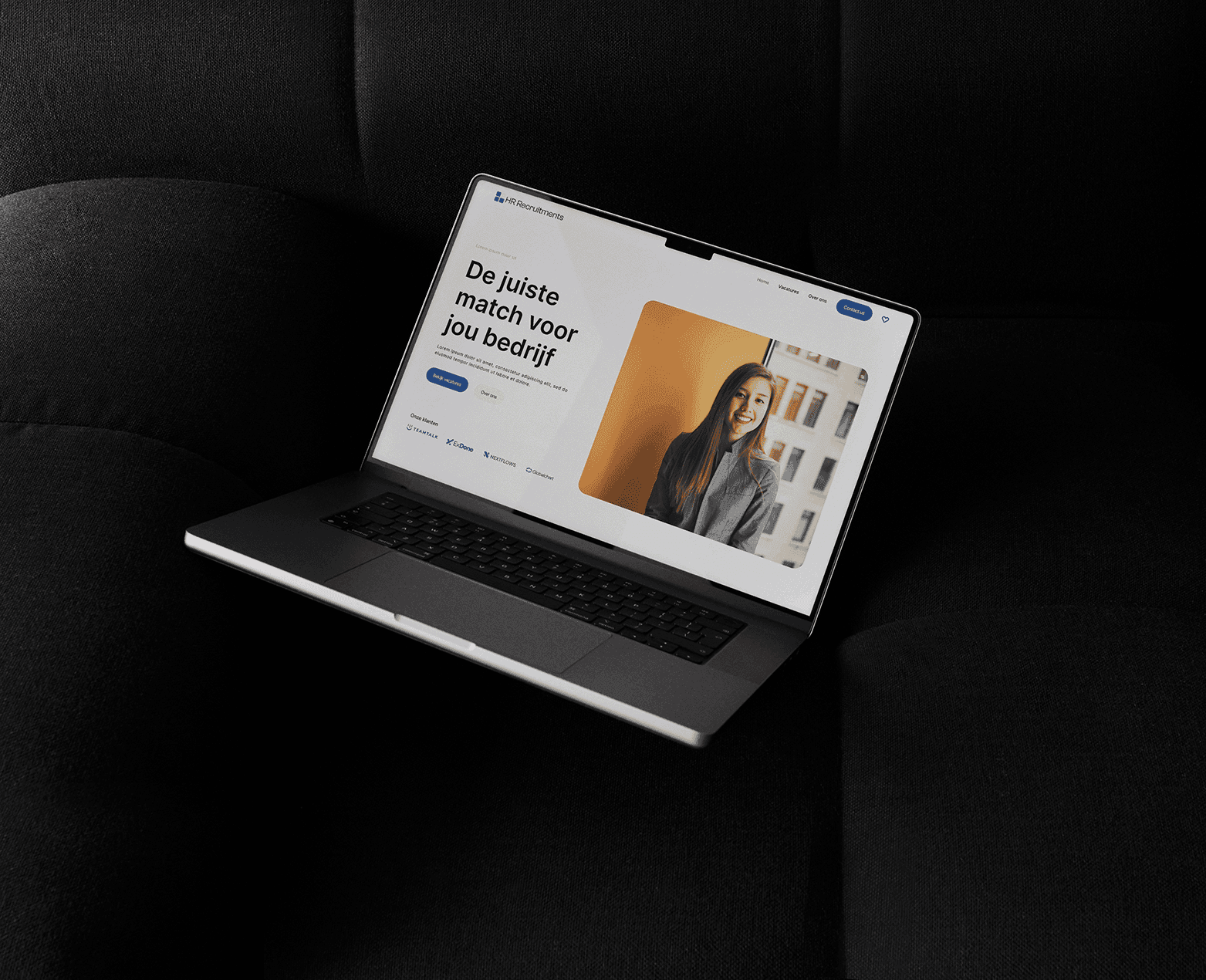 people sitting near table with laptop computer
