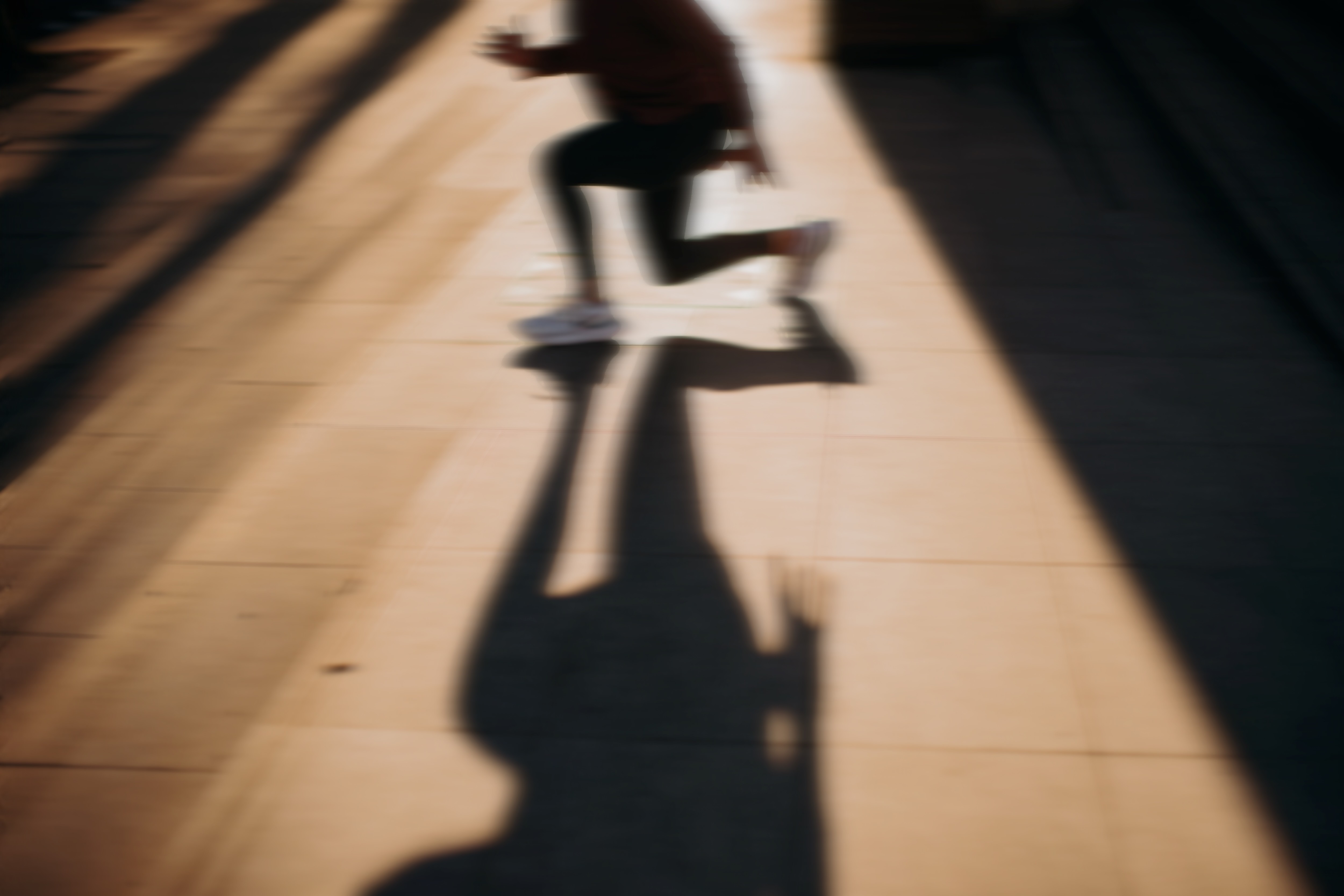 Artistic portrait with red and blue lighting creating a dramatic effect