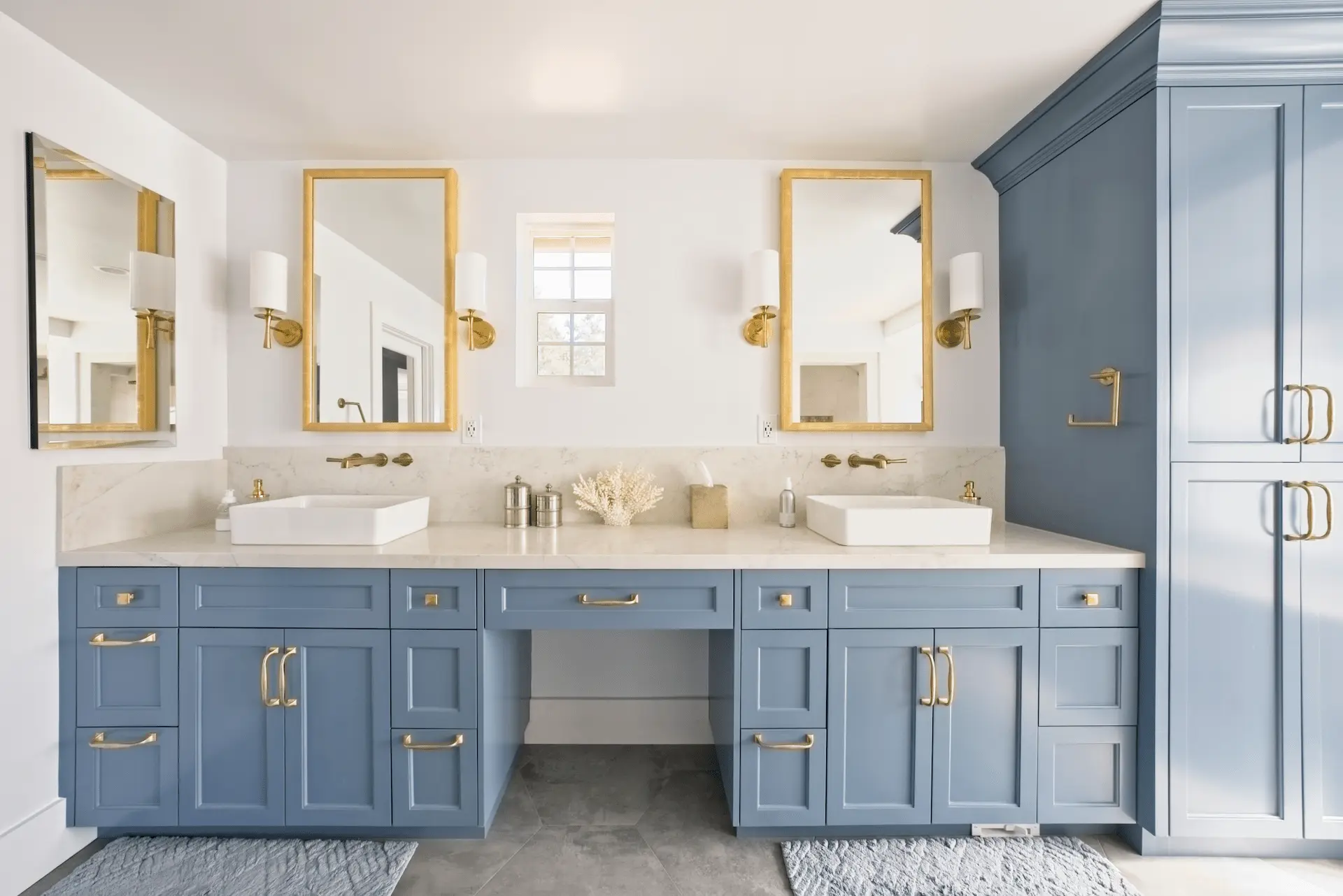 Wide shot of the primary bathroom's double vanity, highlighting the symmetrical design and ample storage in the Ladera Ranch Remodel. Photo by Todd Huge.