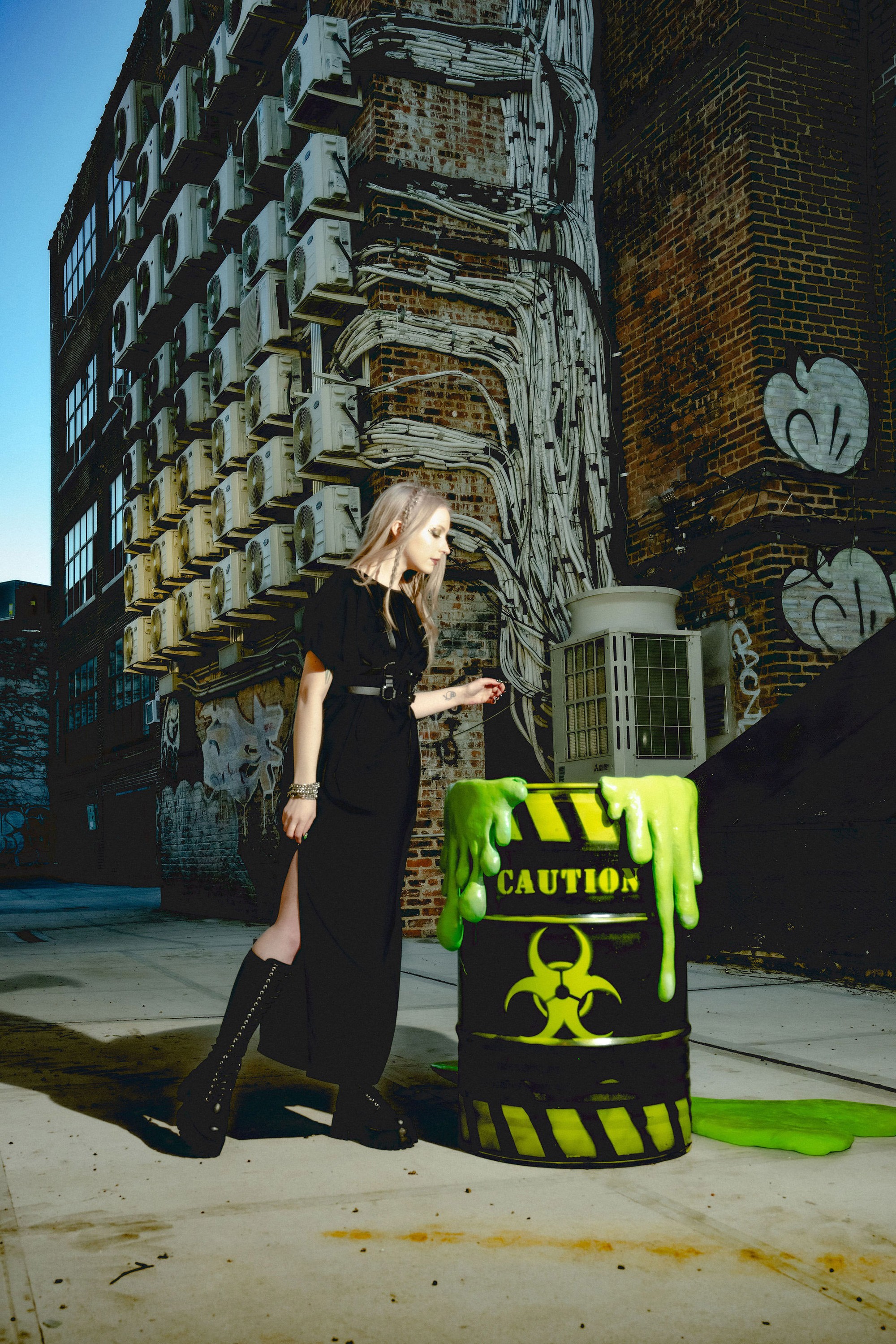KATiiE looking at the neon-green barrel for the Fallout EP release