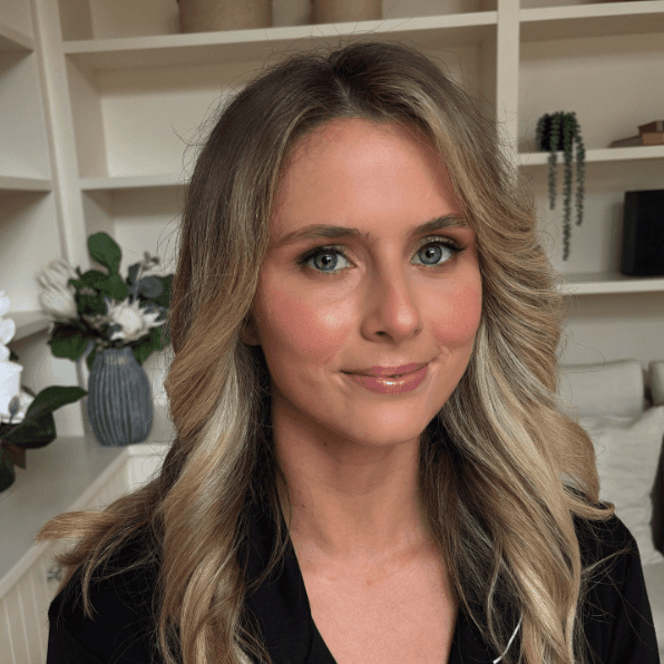 Australian business woman in suit portrait photo with blurry office background