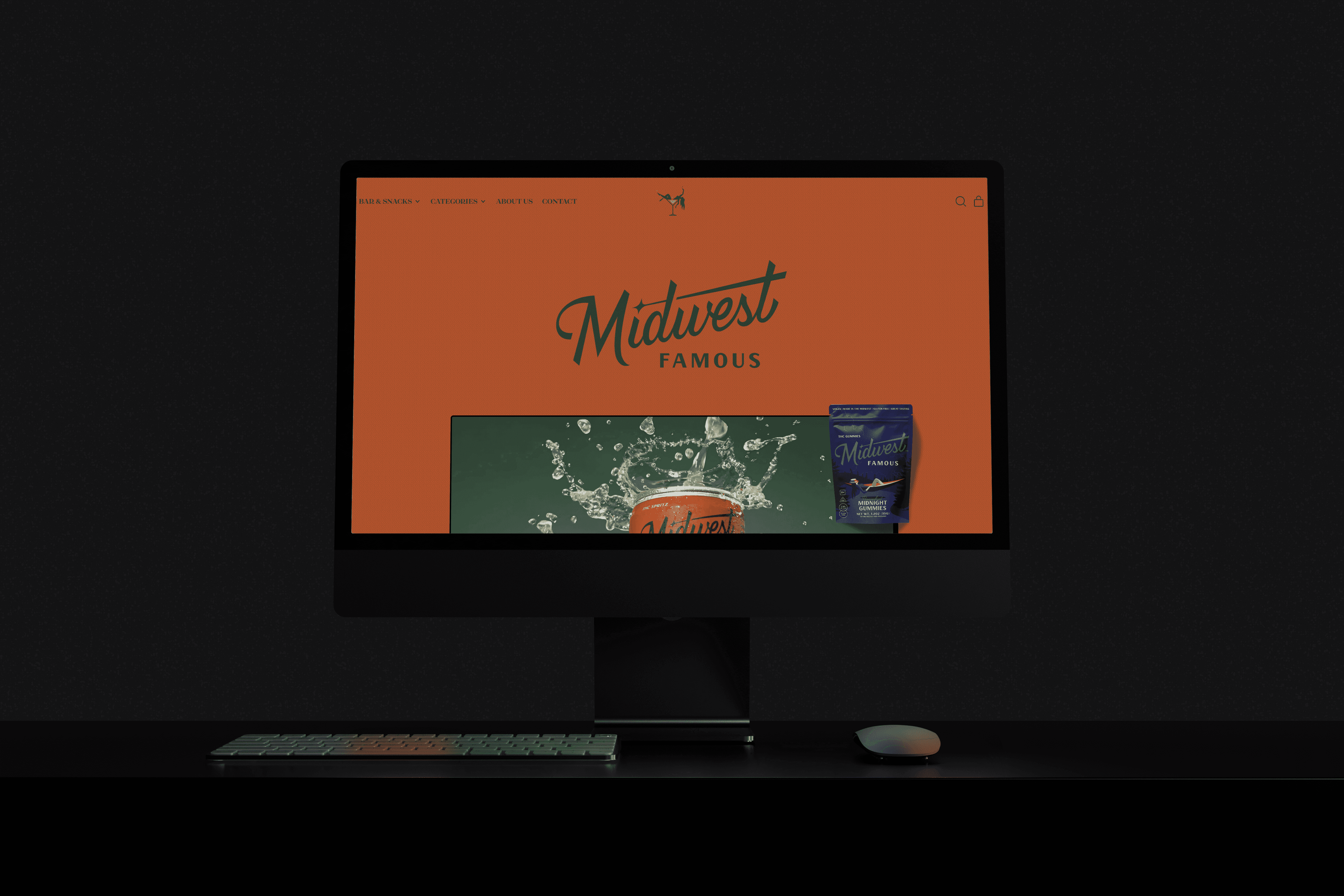 a dark room with a large monitor showcasing a website