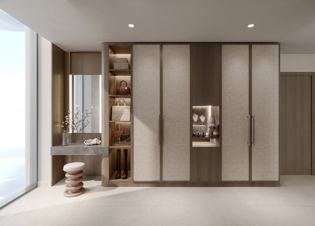 A modern closet featuring a large mirror and a sink, designed for functionality and style at Portside Square.
