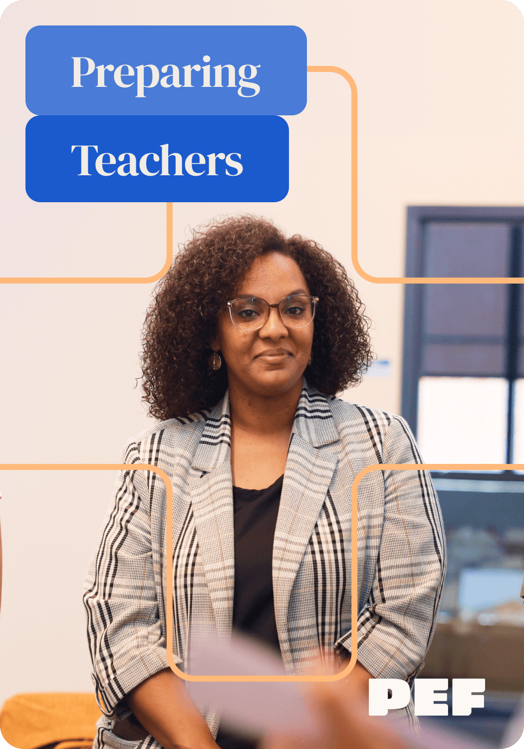 Teacher standing at PEF's office, representing PEF's teacher residency program.