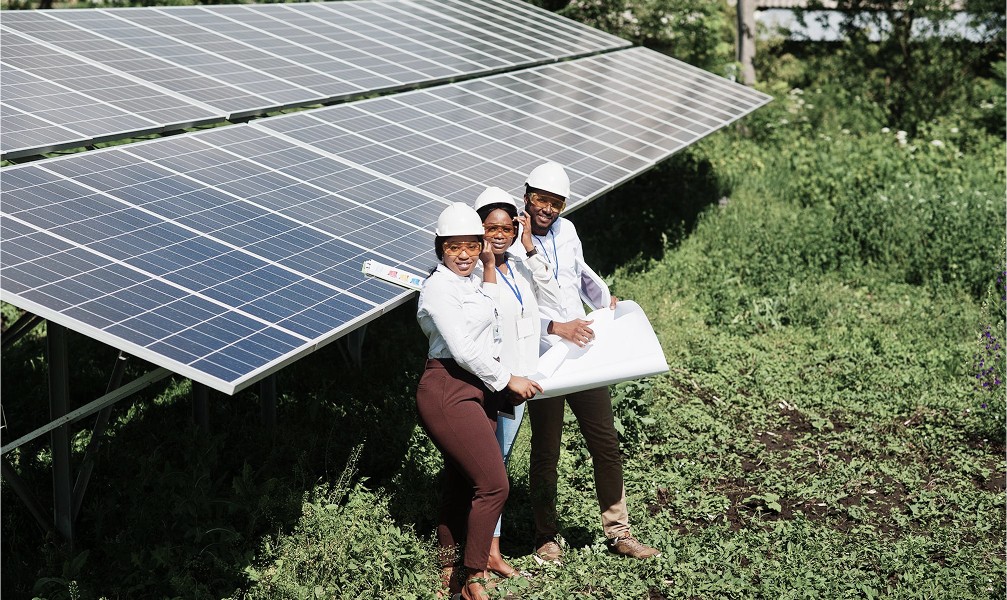 technician viewing solar panels