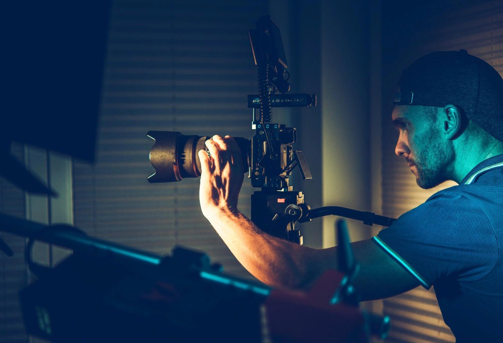 person holding a camera and shooting