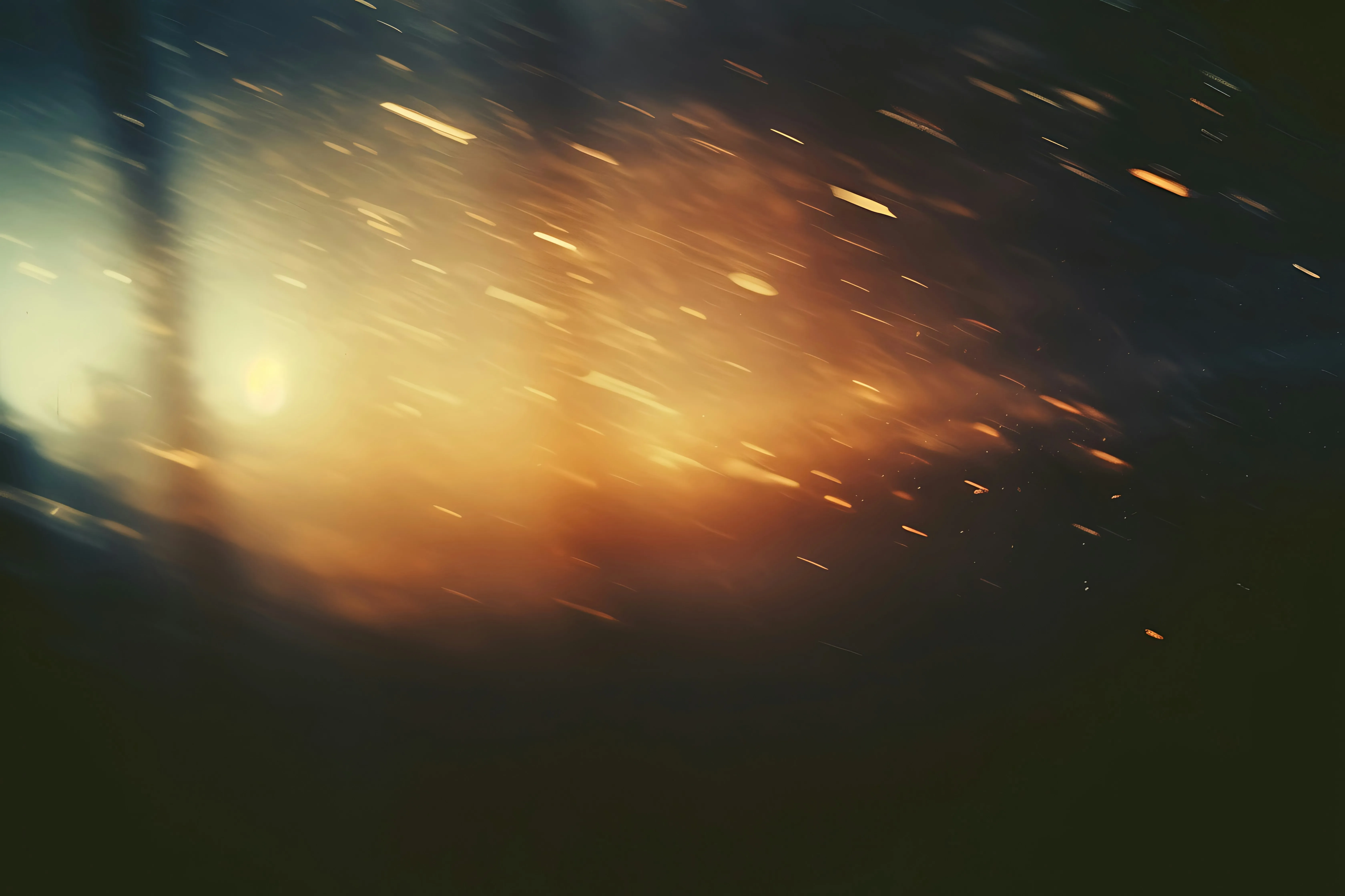 Abstract sparks and light streaks in dark background