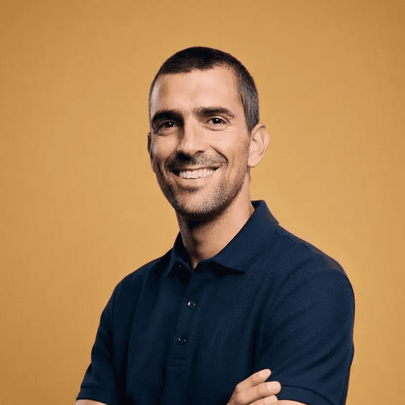 Team member portrait on blue background