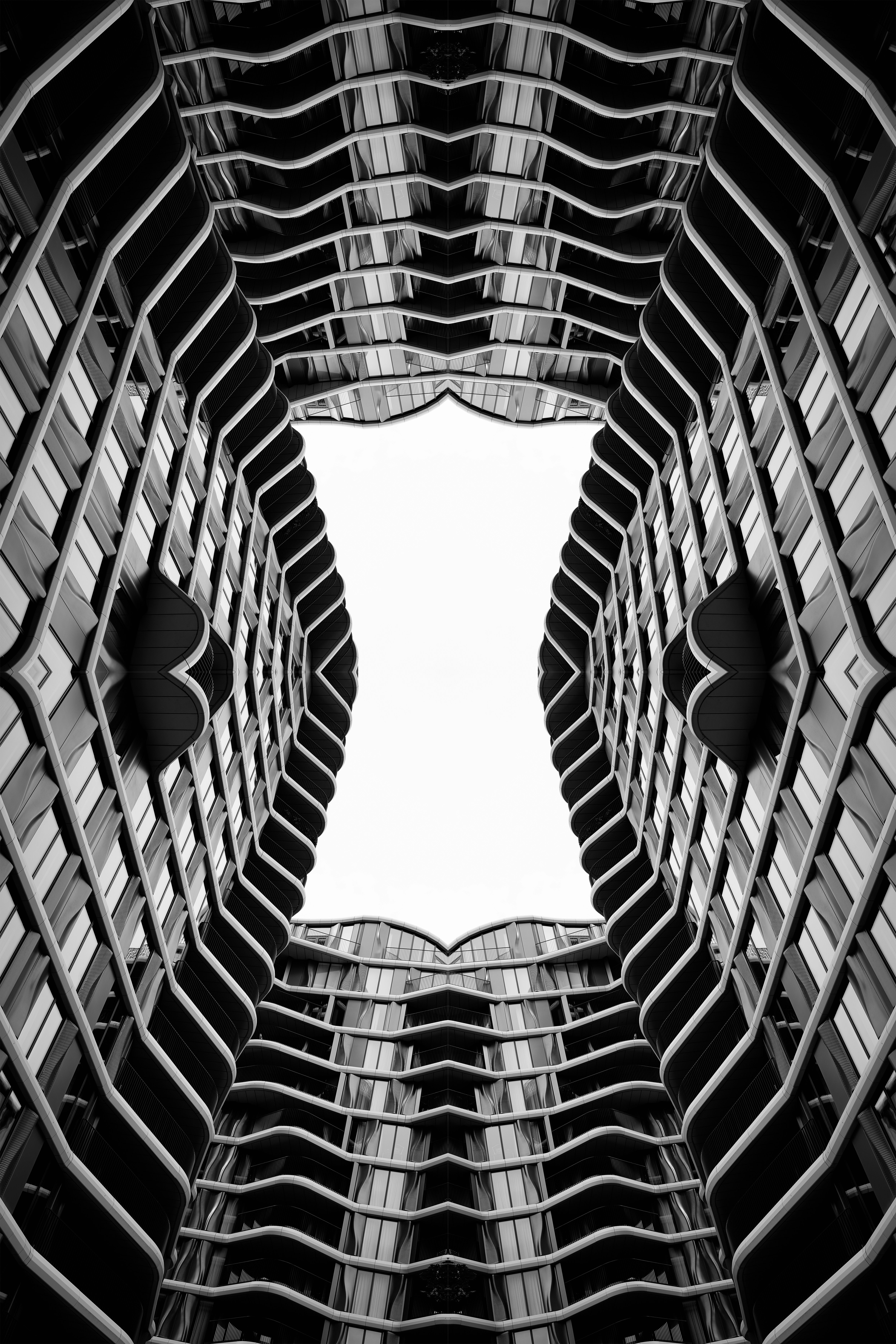 Symmetrical view looking up at a modern building facade