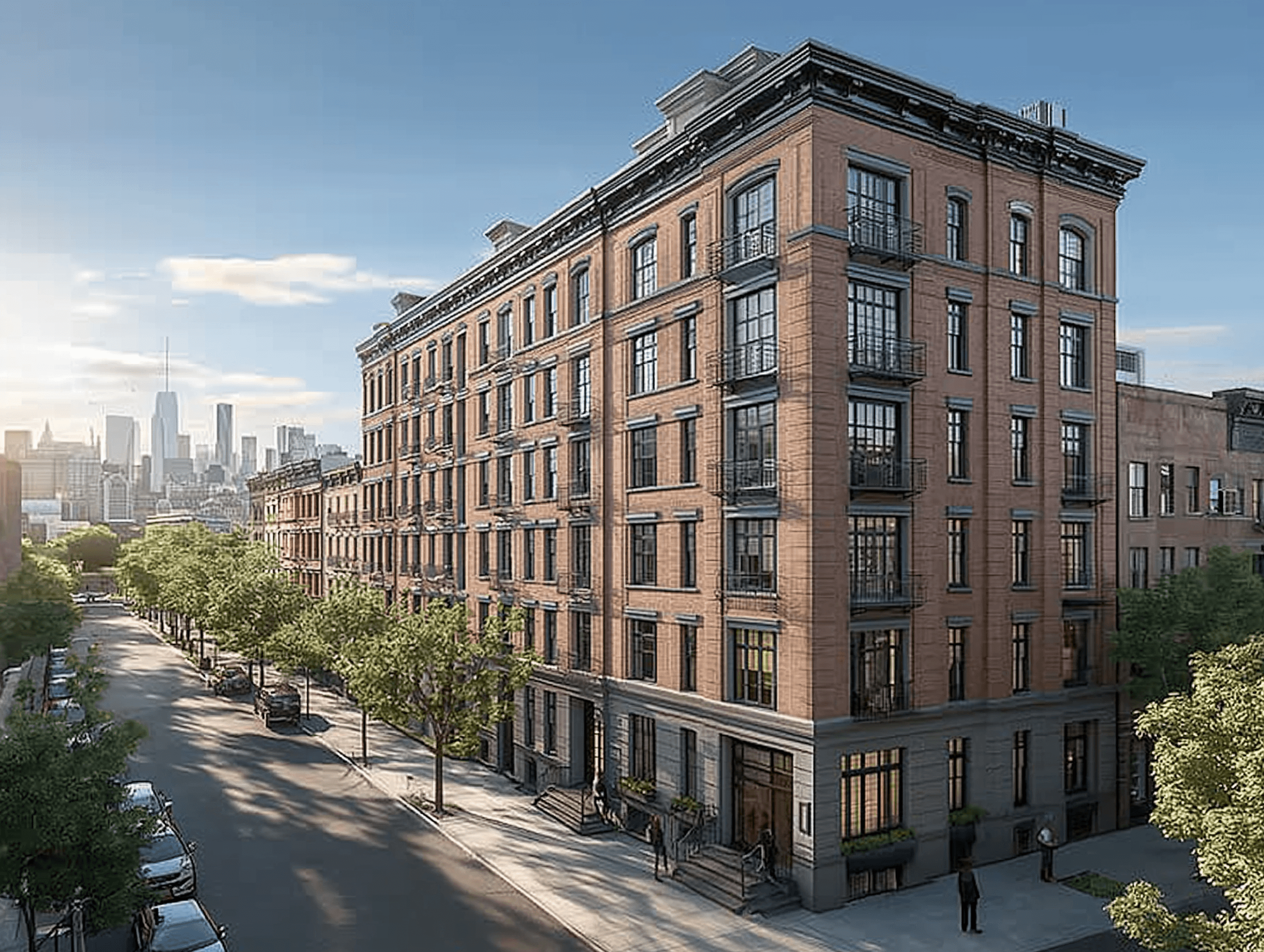 Exterior of a classic red brick apartment building with black metal balconies, located on a tree-lined city street with a distant skyline view.