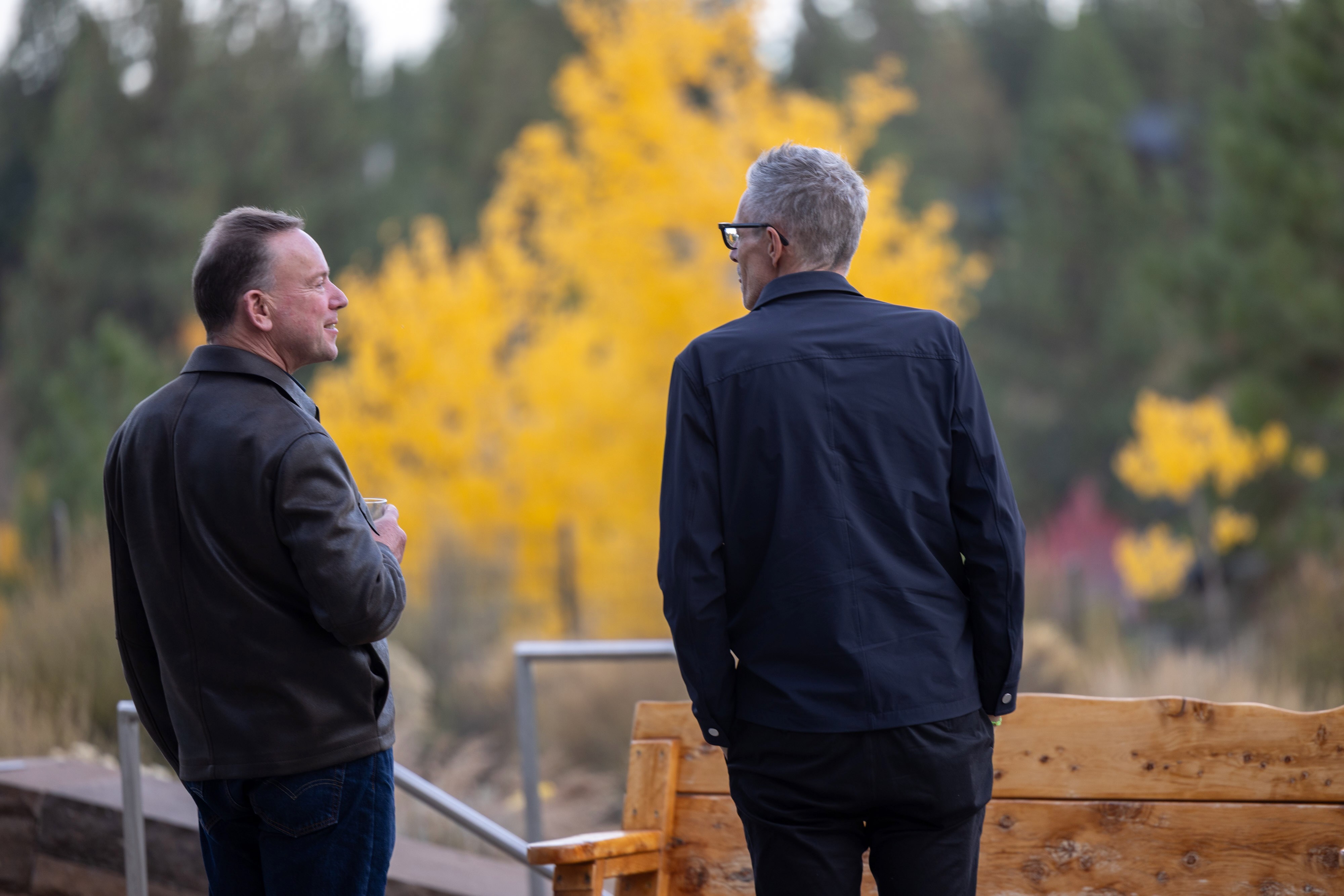 Sir Geoff Mulgan and Jamer Hunt talking outside at the Artificiality Summit