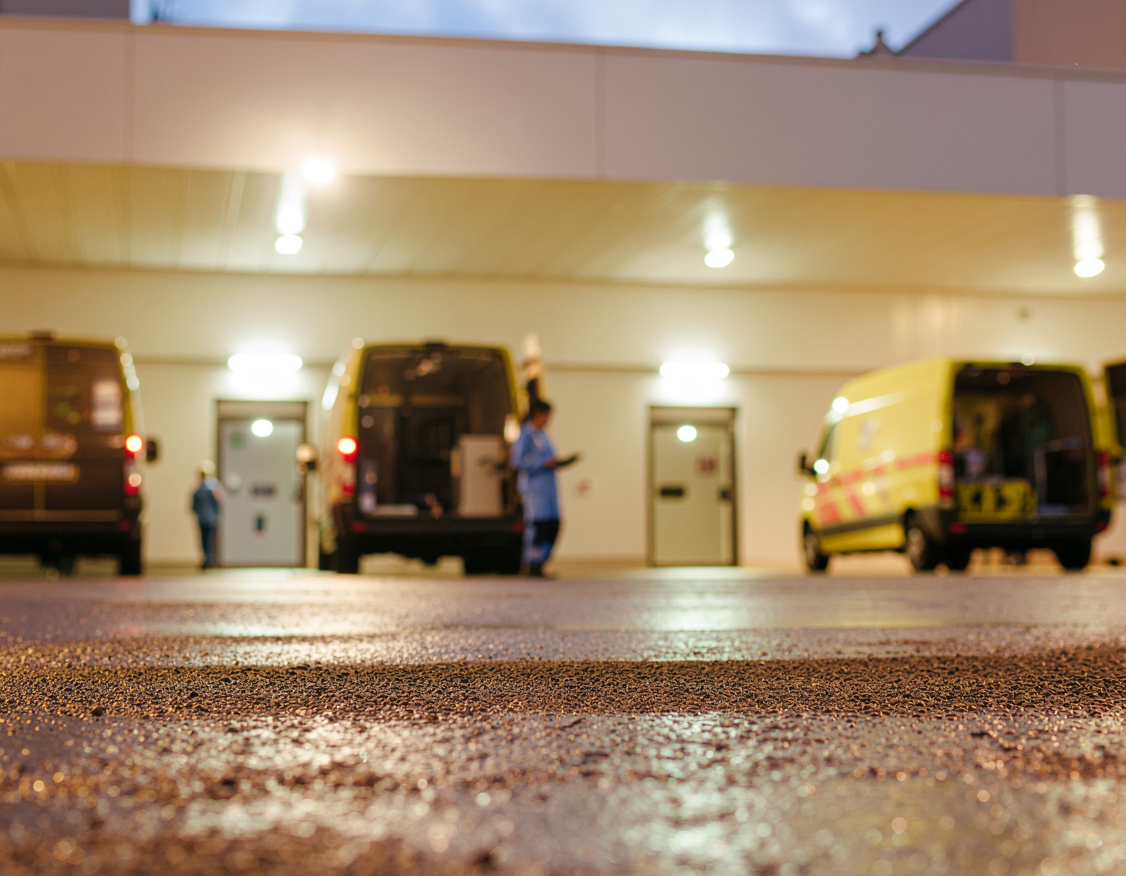 ambulance bay with staff moving