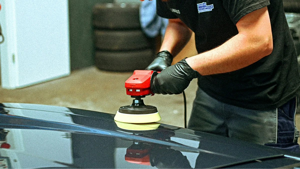 HyperAuto Care Paint Correction service in a professional auto care workshop