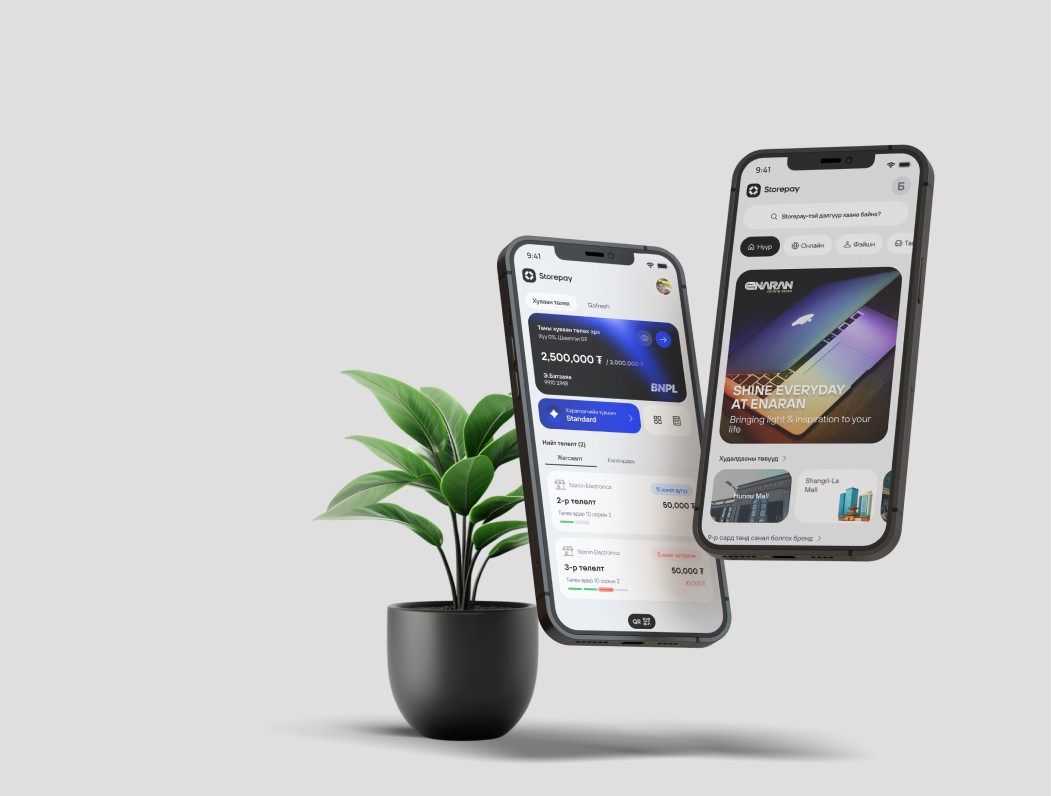 woman sitting around table holding tablet