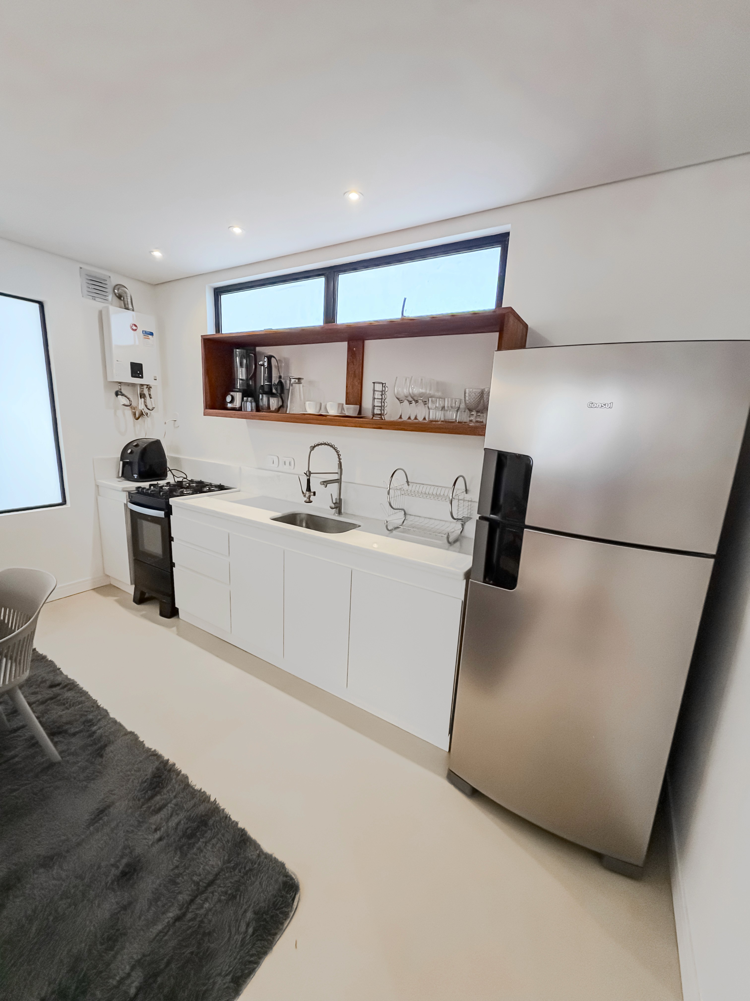 Meditation corner focus, showing soft floor cushions, low lighting, and sound machine.