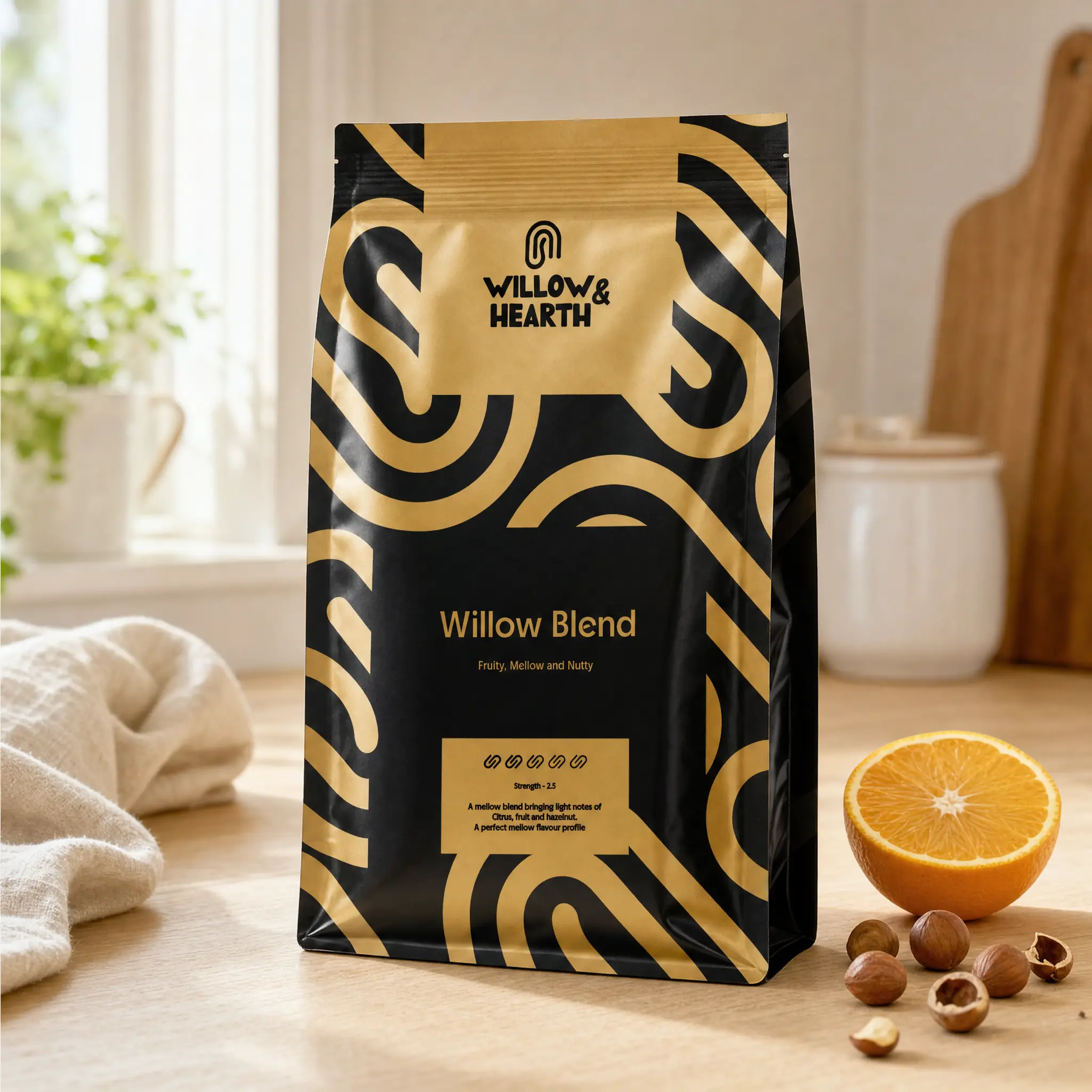 Willow & Hearth Willow Blend coffee bag in black and gold on a kitchen counter