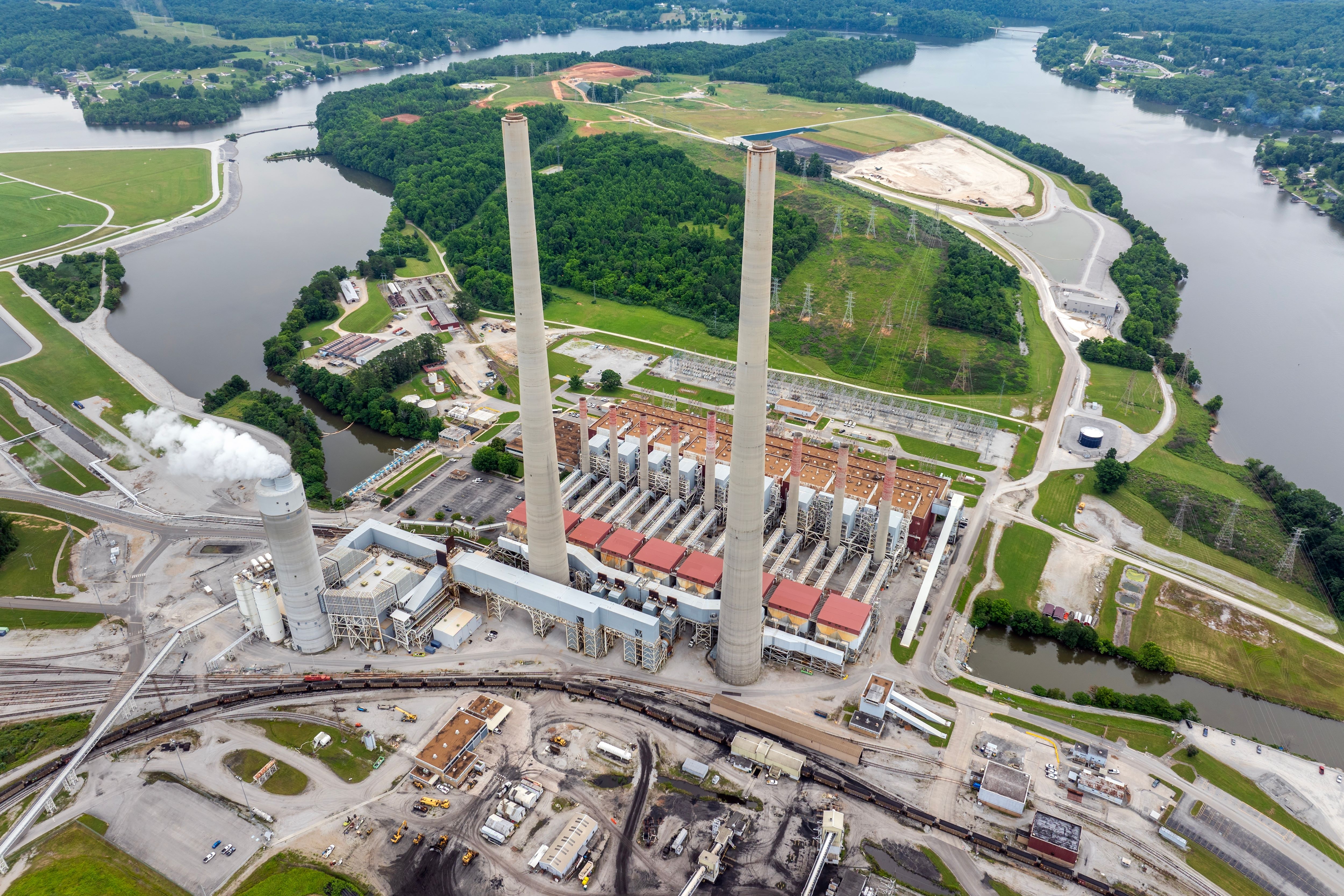 Power plant facility with turbines and generators producing electricity