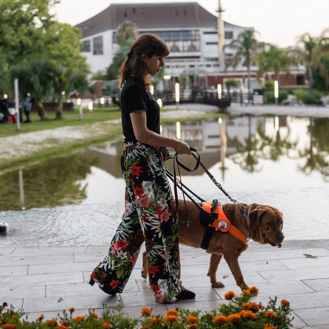 A woman with a guide dog