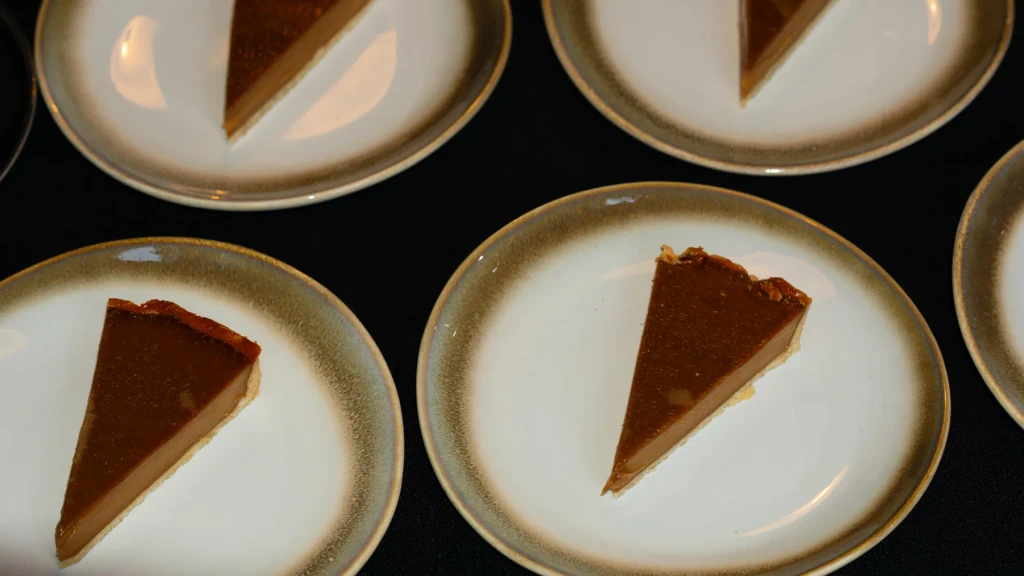 Overhead of brown sugar tart slices on stoneware plates