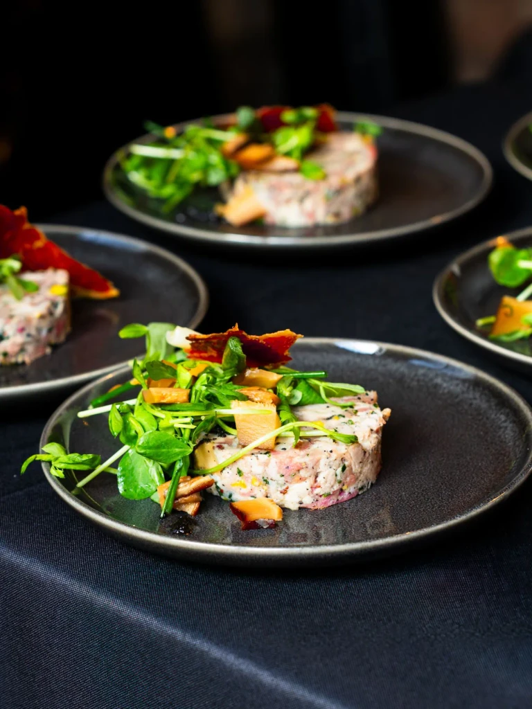 Lake District chicken and ham hock terrine with pea shoots and a Parma ham crisp