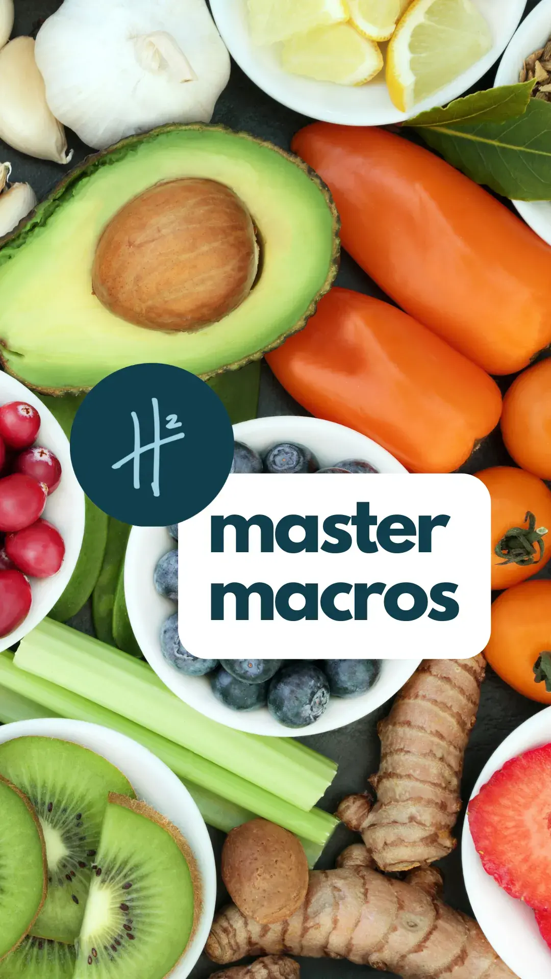 A diverse assortment of fresh fruits and vegetables, including avocados, tomatoes, ginger, blueberries, kiwis, and celery, artfully arranged alongside a logo displaying the text "master macros."