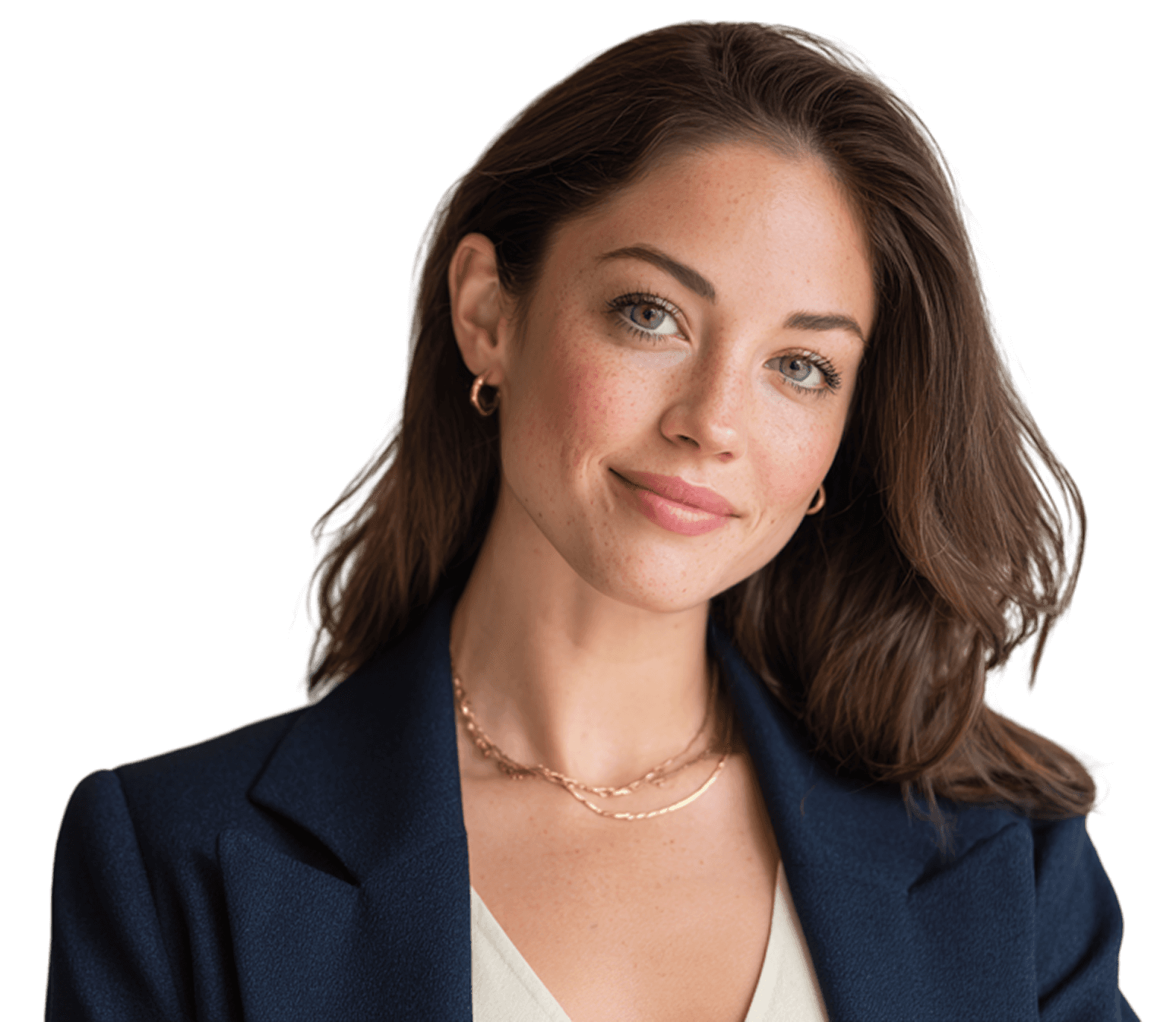 Smiling woman with long brown hair wearing a navy blazer and gold jewelry against a black background, conveying a professional and approachable tone.