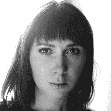 man in white crew neck shirt wearing black framed eyeglasses