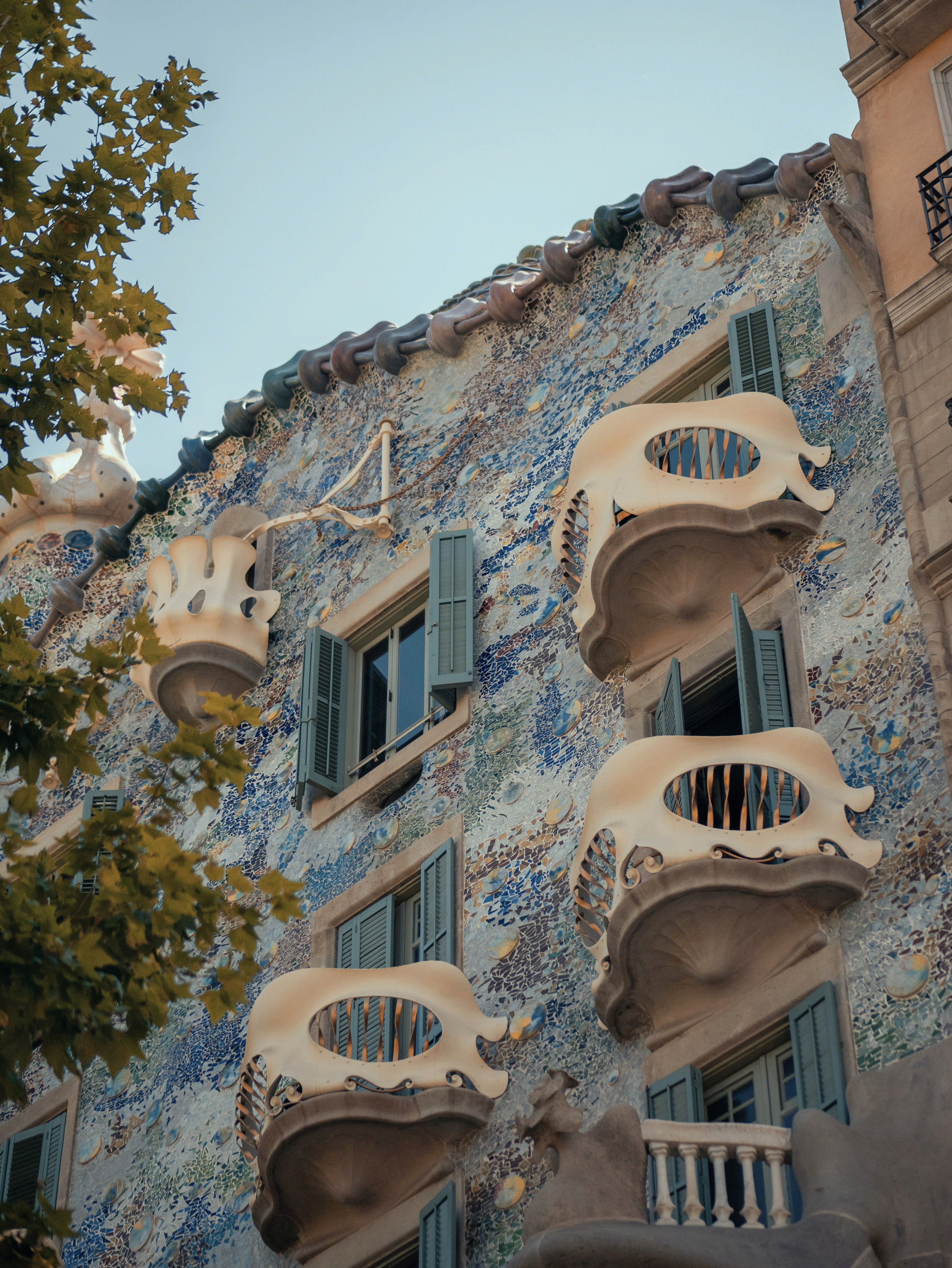 blue and white painted houses on the cliff