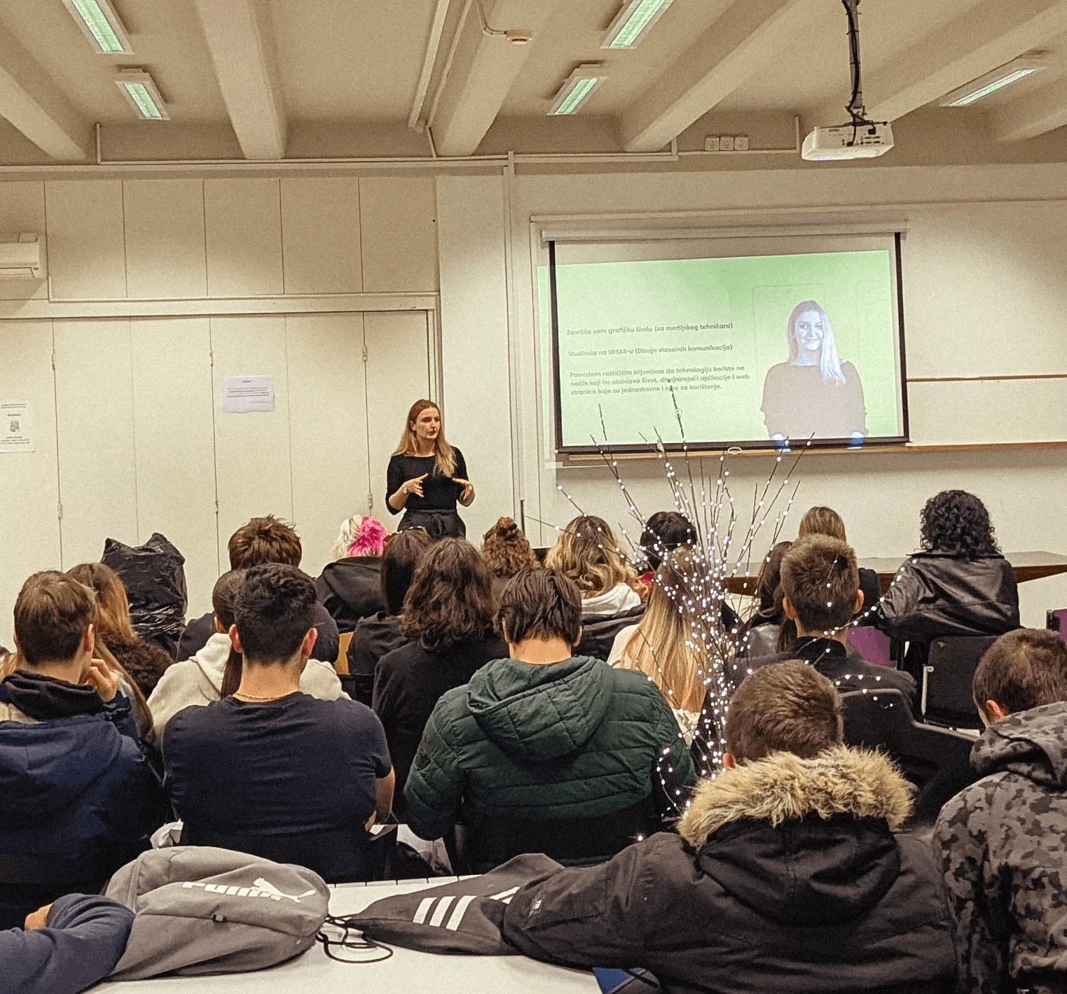 Petra drinking coffee and working