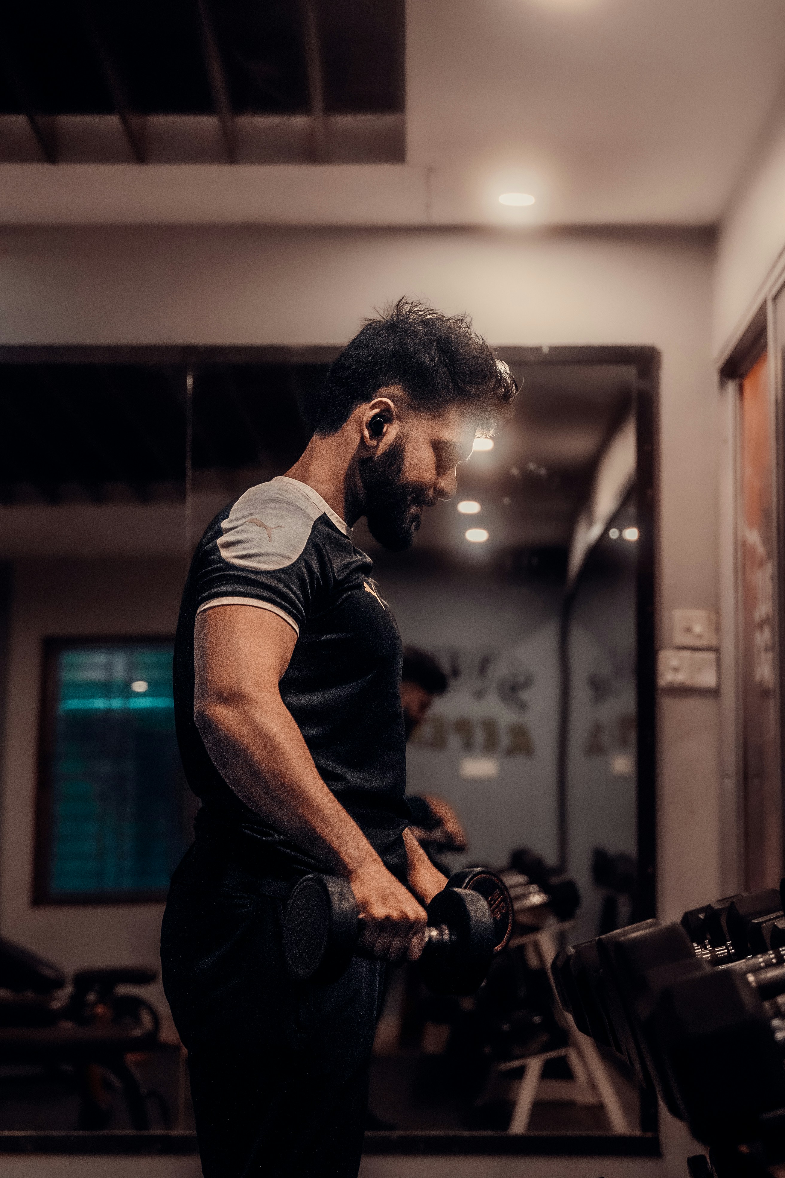 A man is working out in a gym