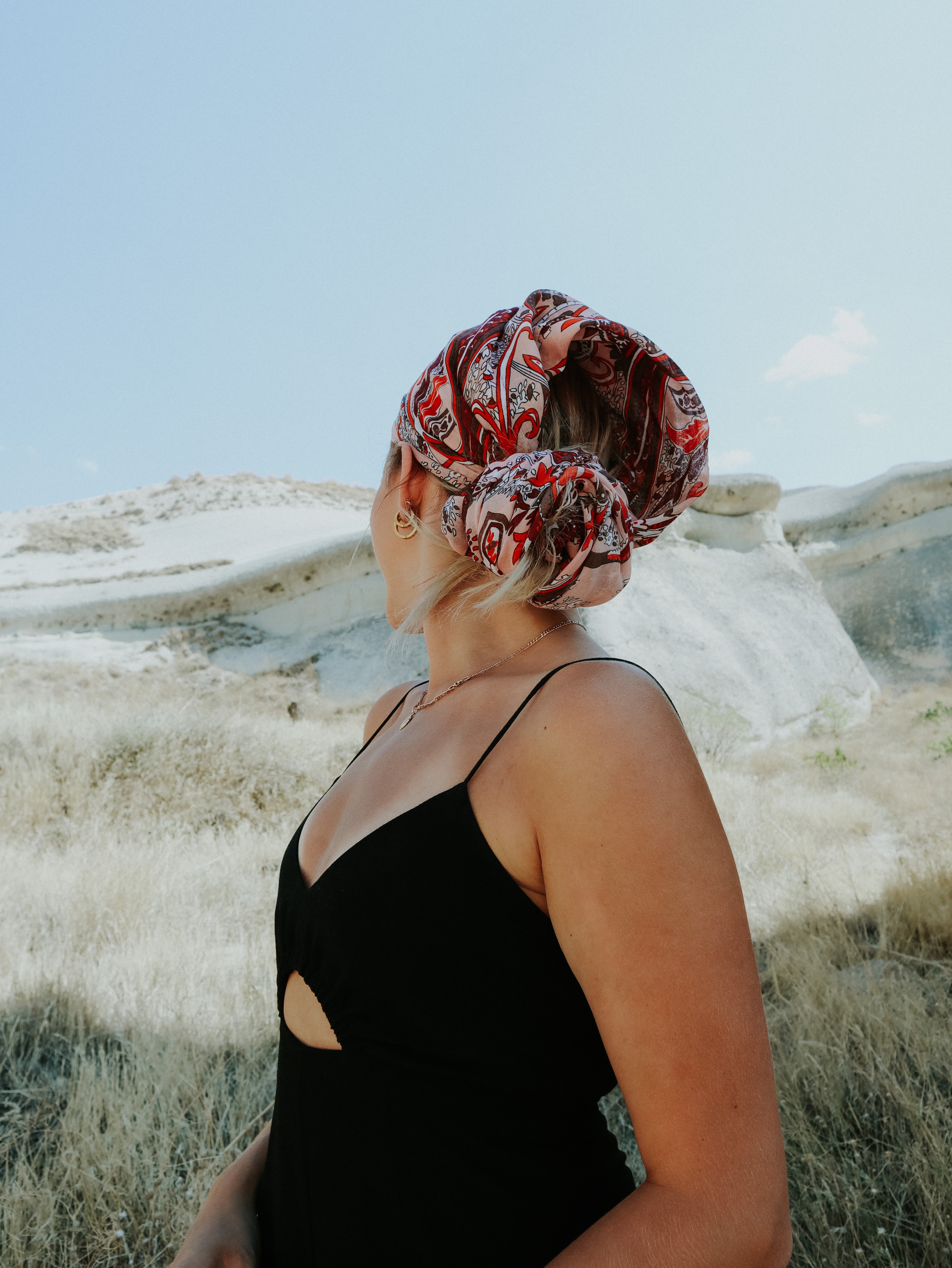 Woman wearing a scarf on her head