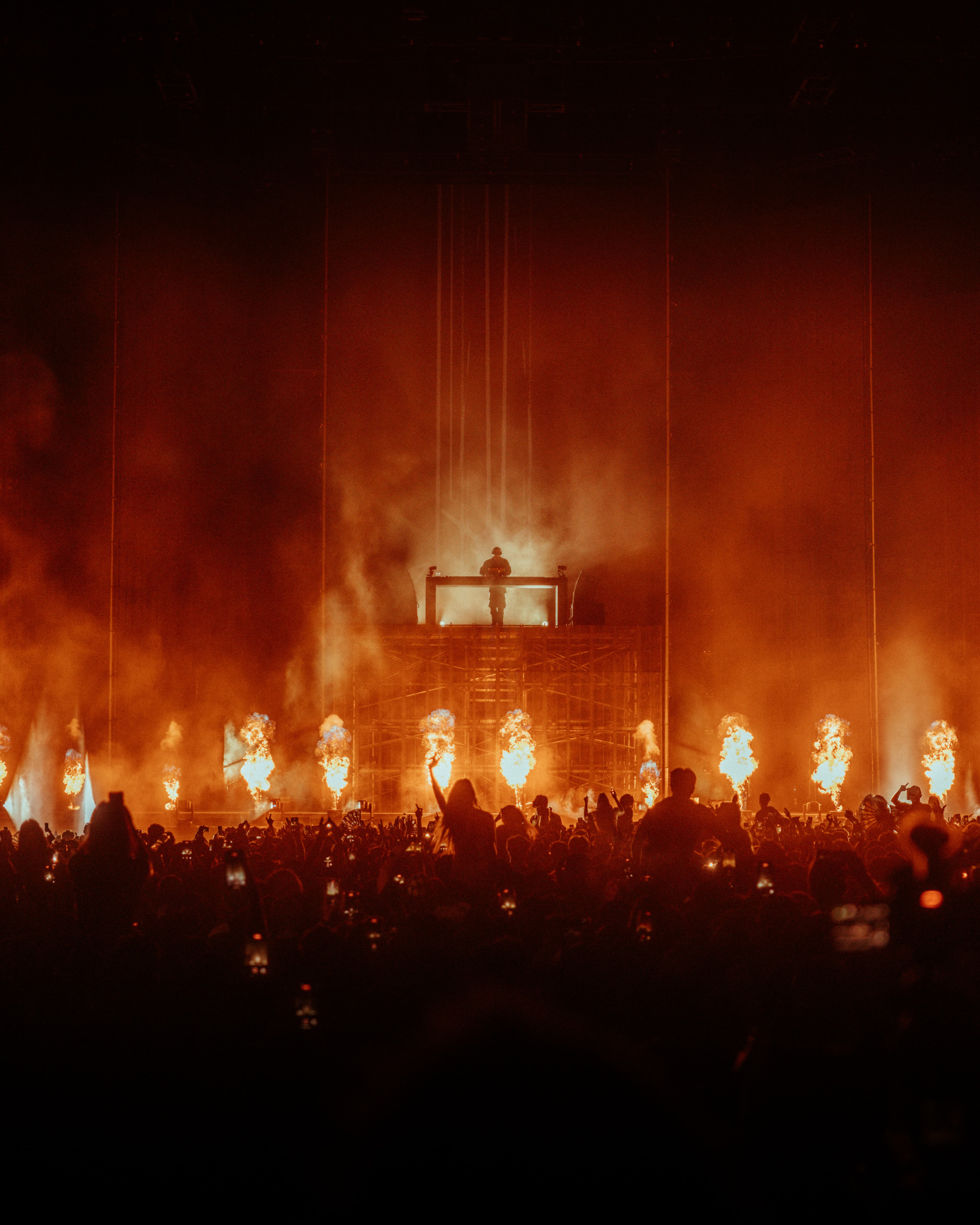 Dom Dolla performing live with pyrotechnics at LA State Historic Park, photographed by Brandon Densley of A World Away