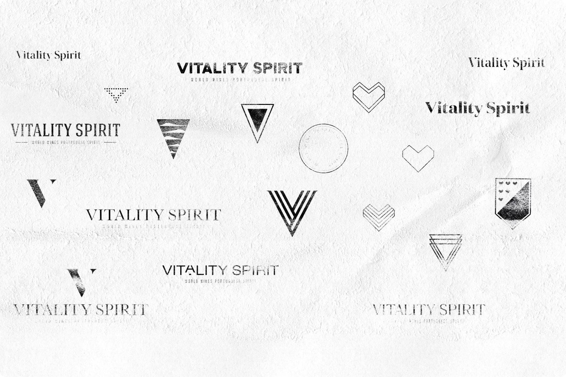 Monochrome “Vitality Spirit” logo collage on textured white paper, featuring geometric hearts, triangles, circles, and bold typography.