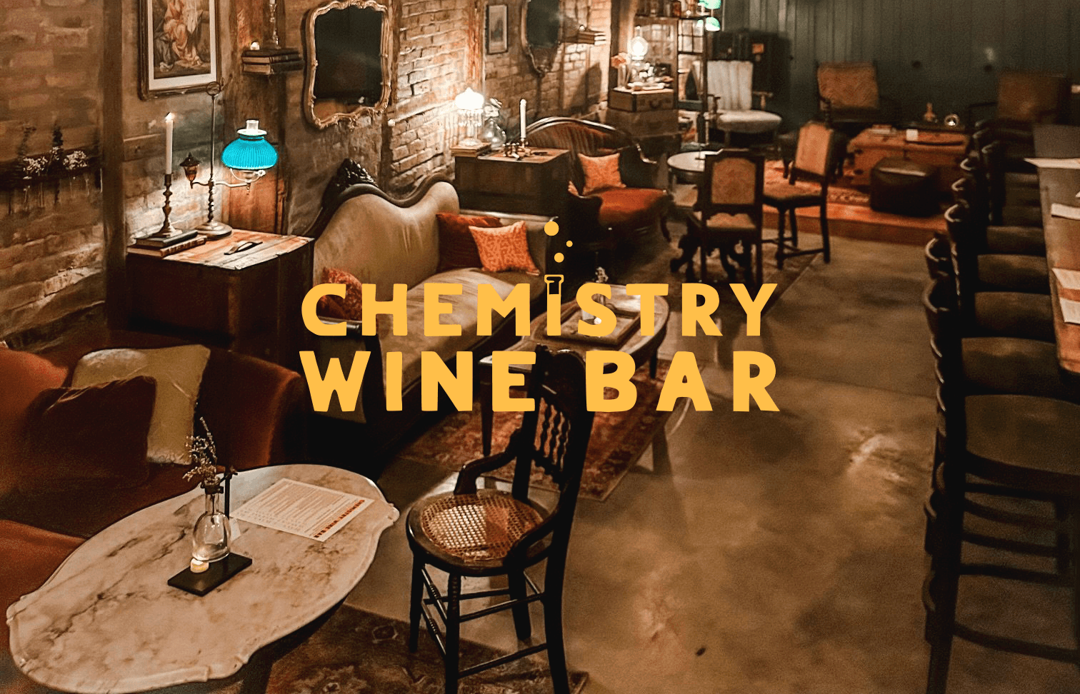 Graphic design header for Chemistry Wine Bar — bold, wordmark style logo with decorative sans serif typography, designed by Will Lefkovich.