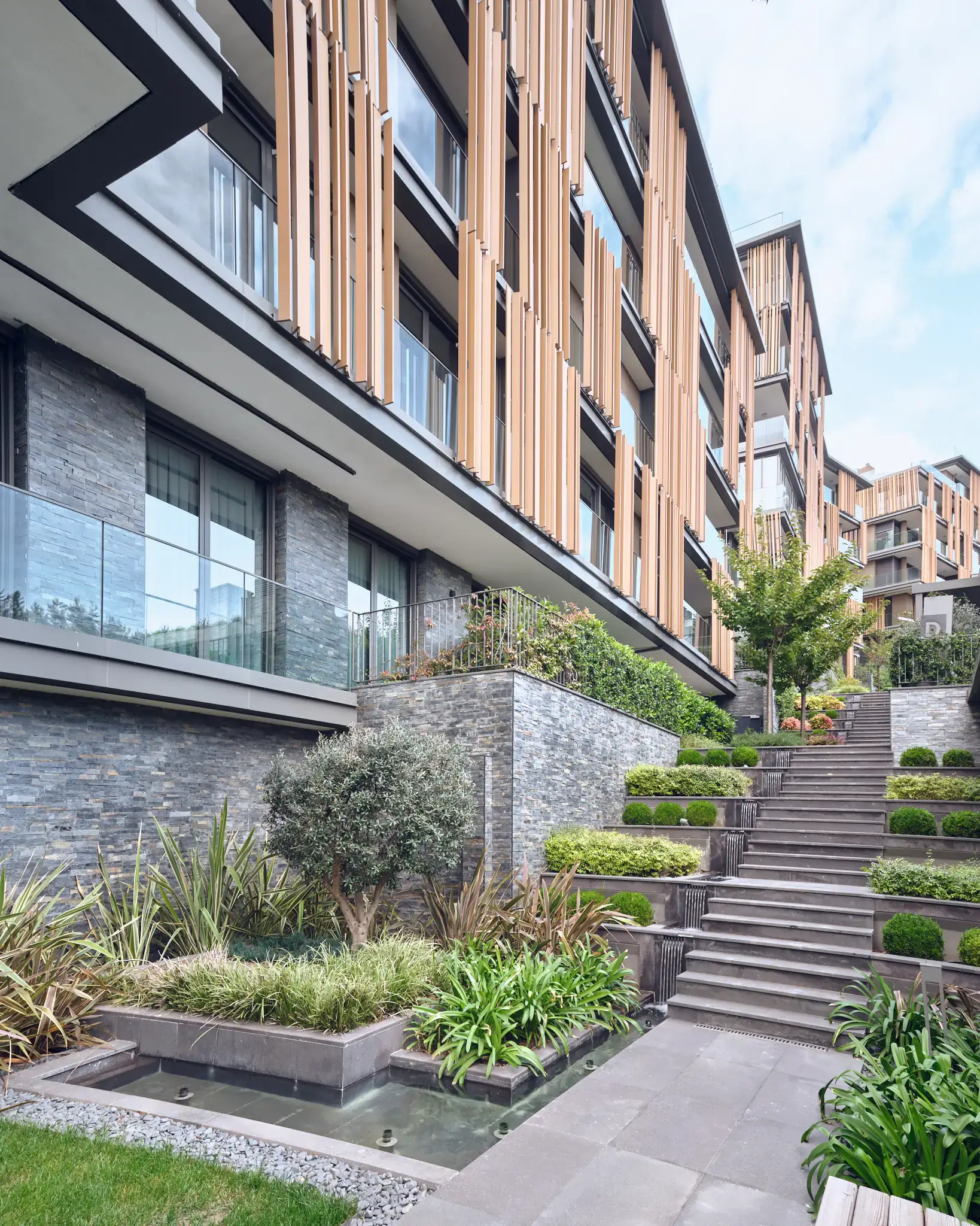 Stepped inner street and landscaping between the blocks