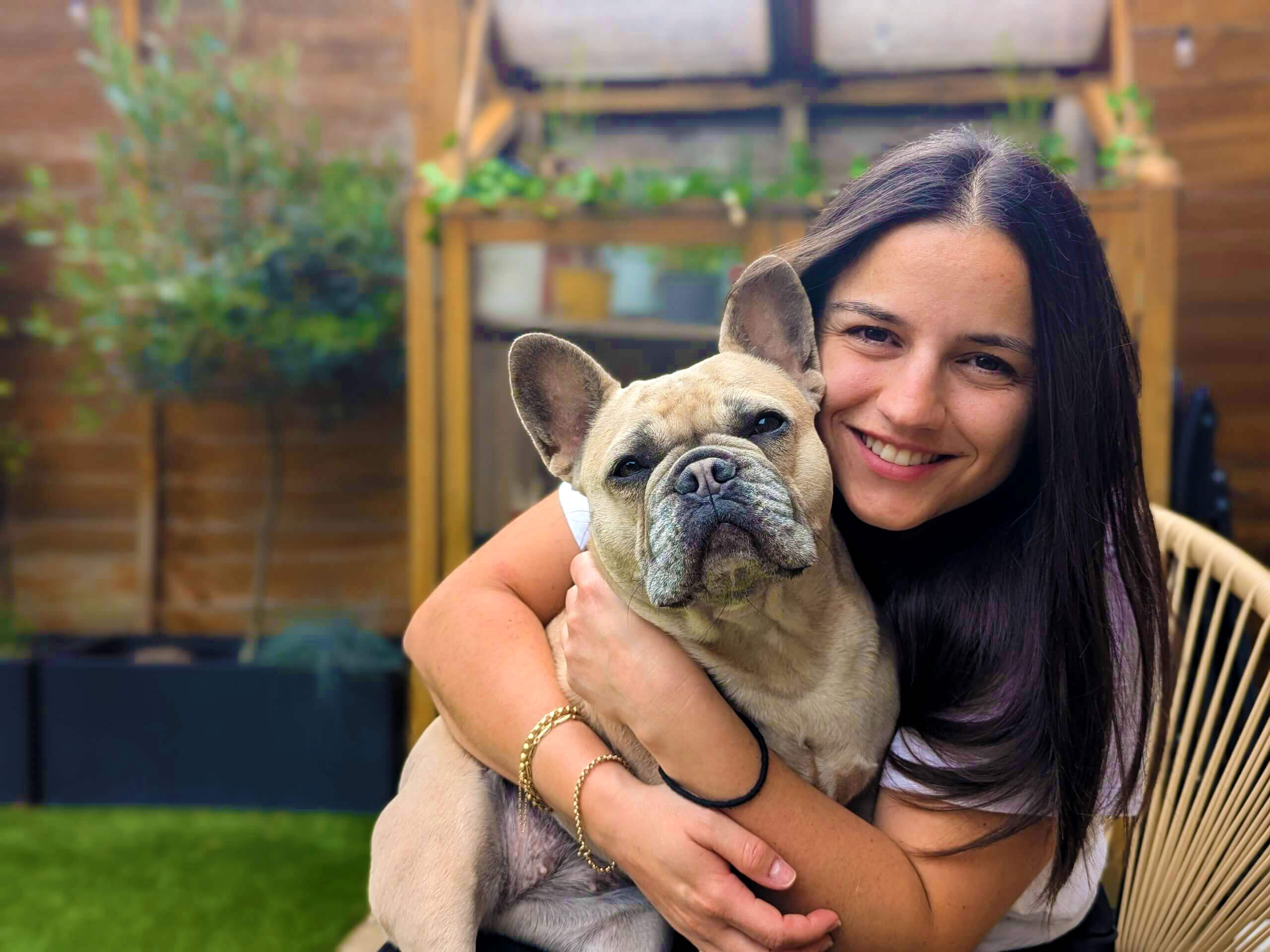 Creative portrait with geometric pink eyewear and bold fashion styling in urban setting