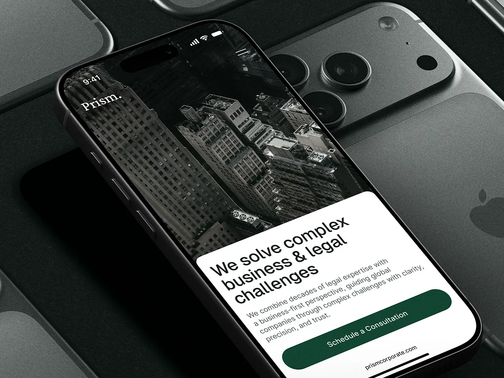 Mobile website mockup for a corporate consulting firm showing a smartphone screen with the headline “We solve complex business & legal challenges” and a consultation call-to-action.