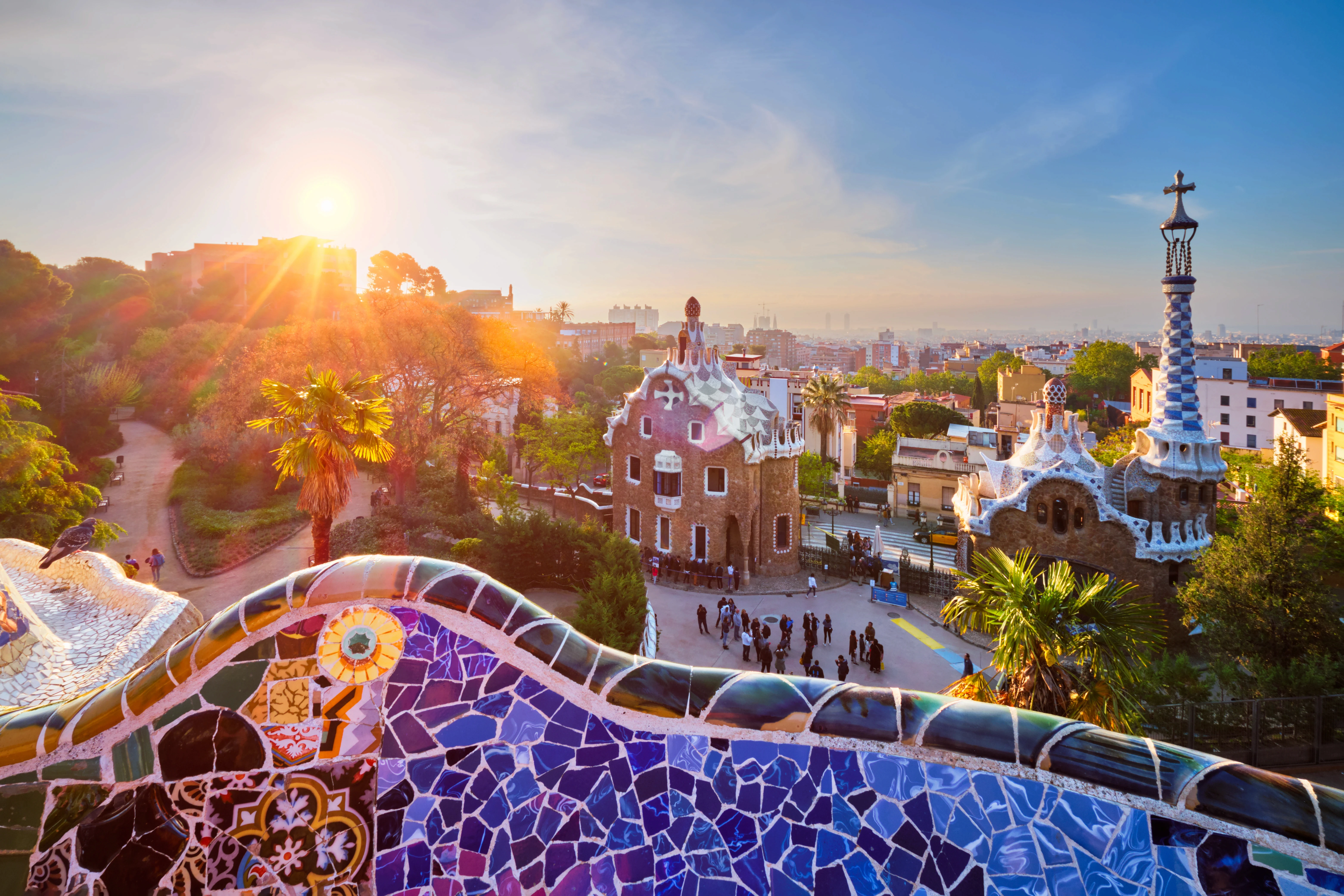 The iconic gingerbread-style entrance pavilions of Park Güell in Barcelona, Spain.