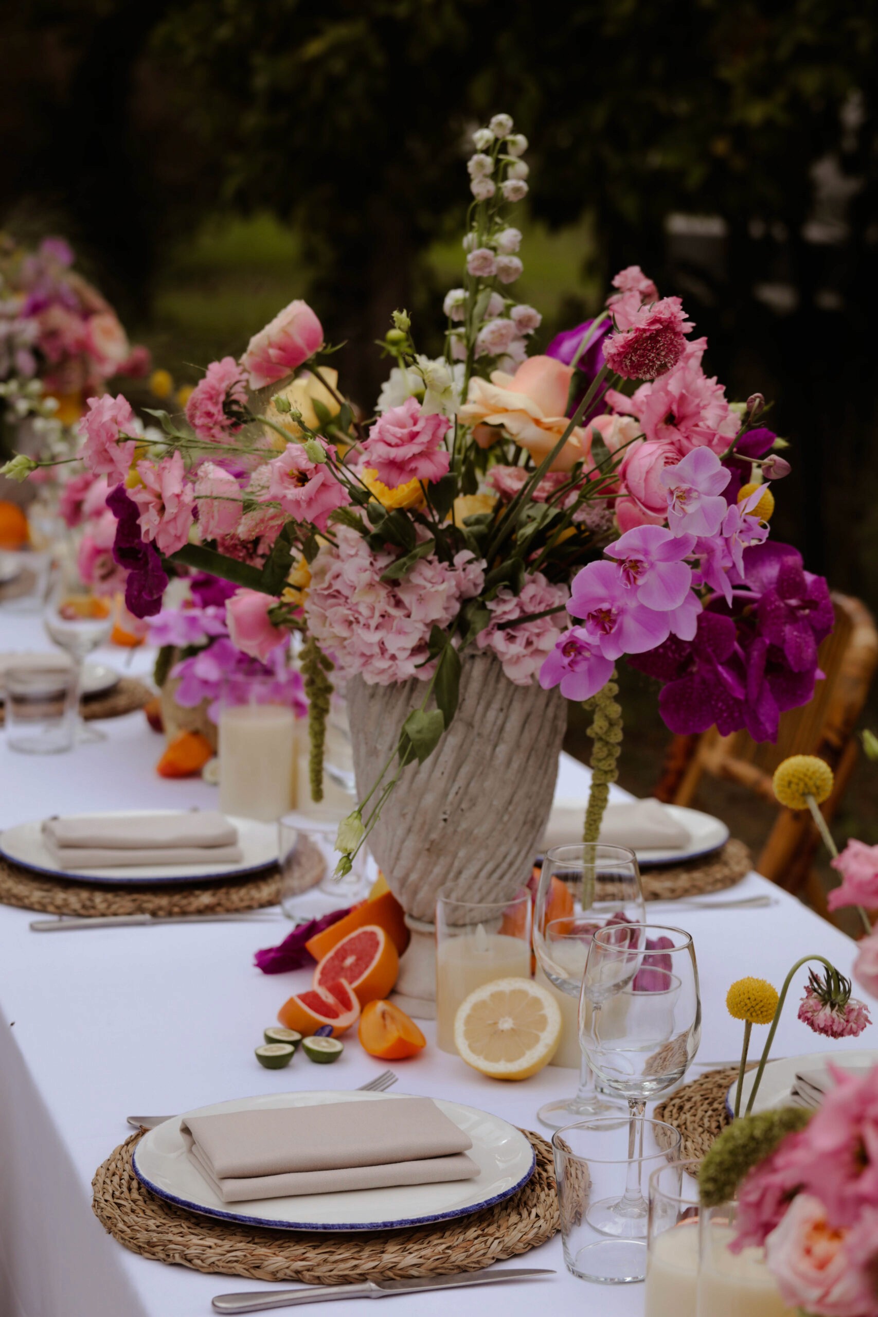 Wedding floral arrangement with fruit accents
