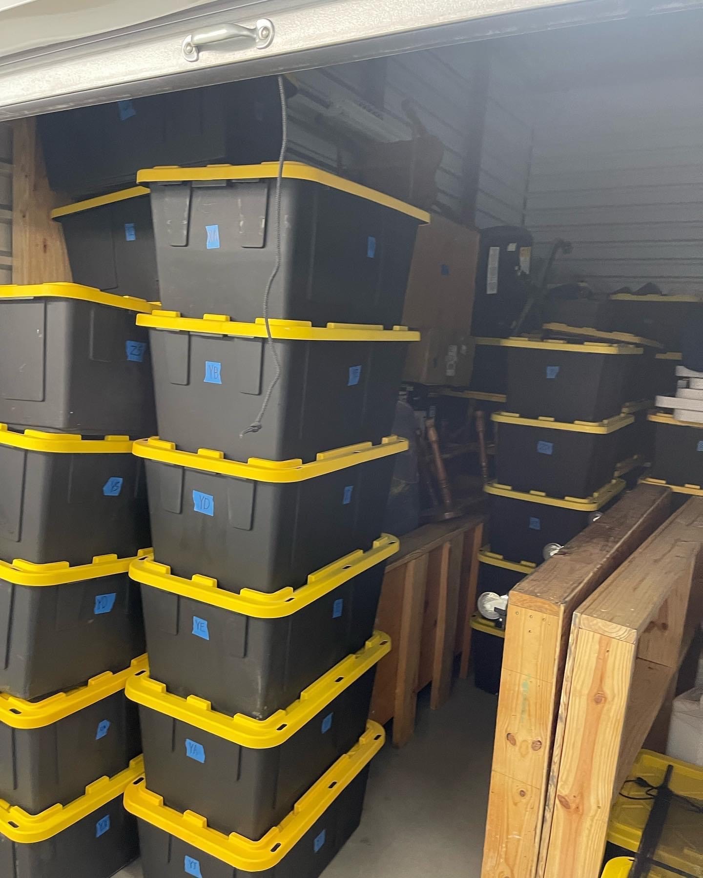 Climate-controlled storage units in The Woodlands to protect your sensitive items for residential and commercial purposes - Hodges Family Movers organizing and labeling office inventor during commercial moving job for a corporate client in The Woodlands