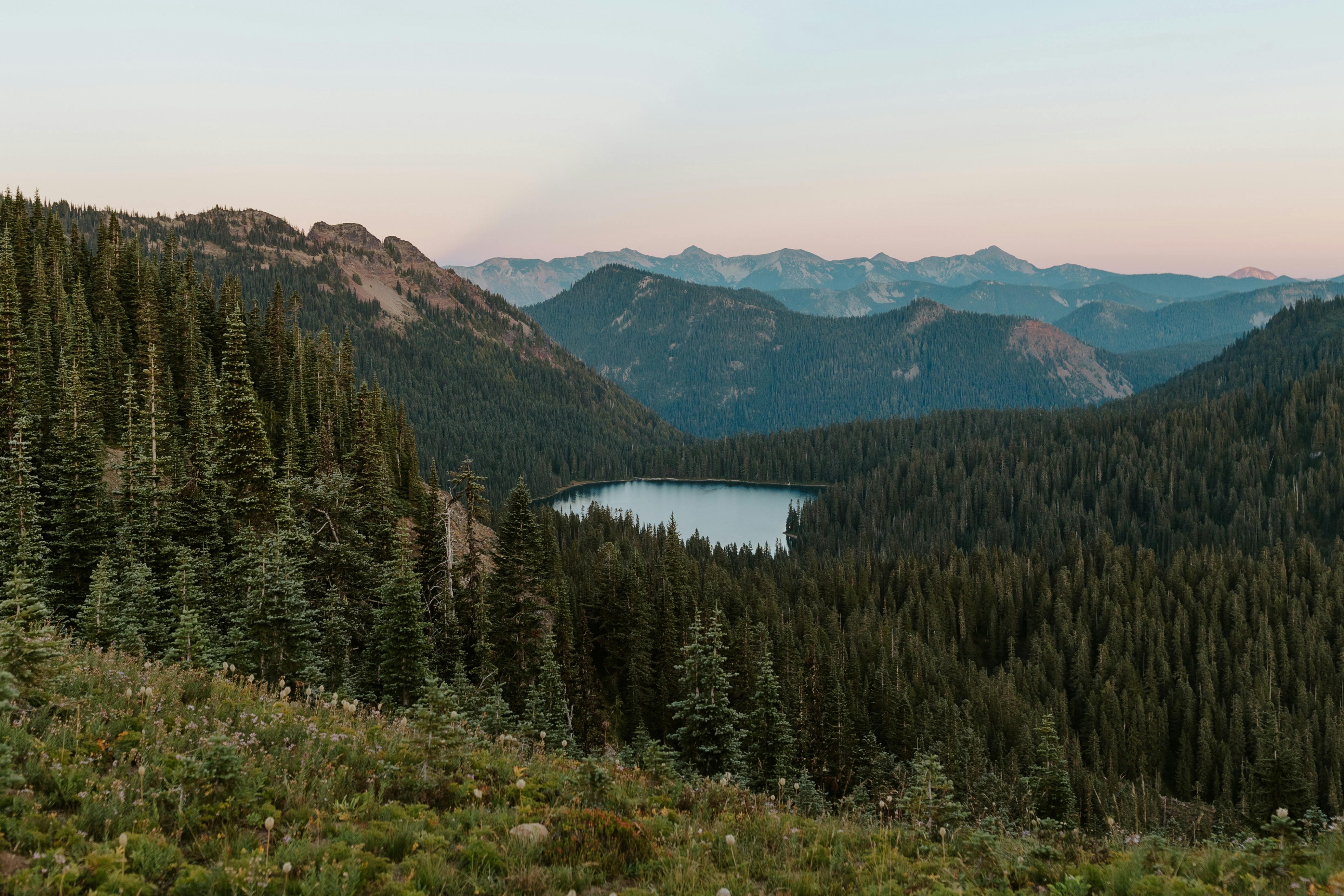 A scenic view of a lake and mountains