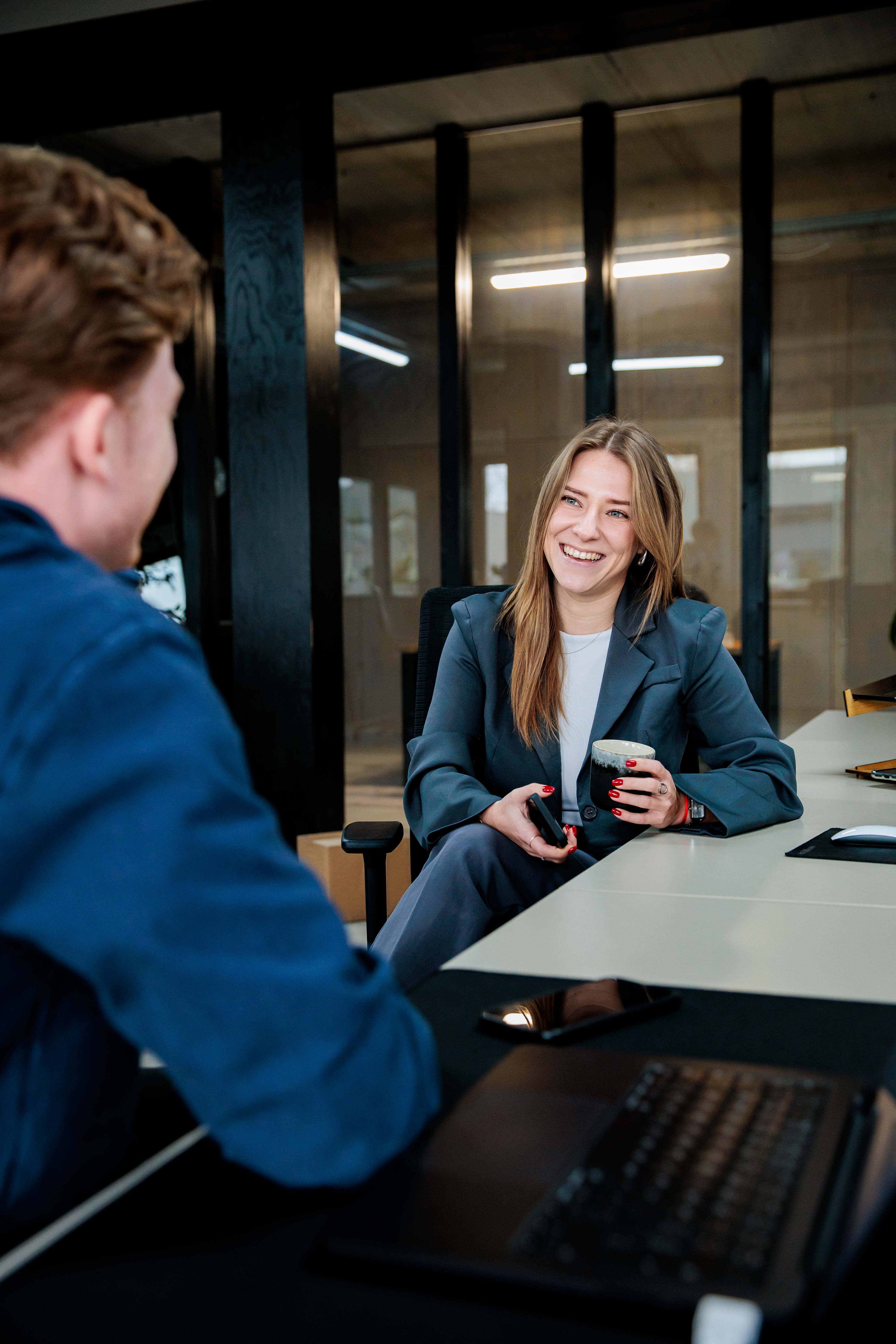people talking in office