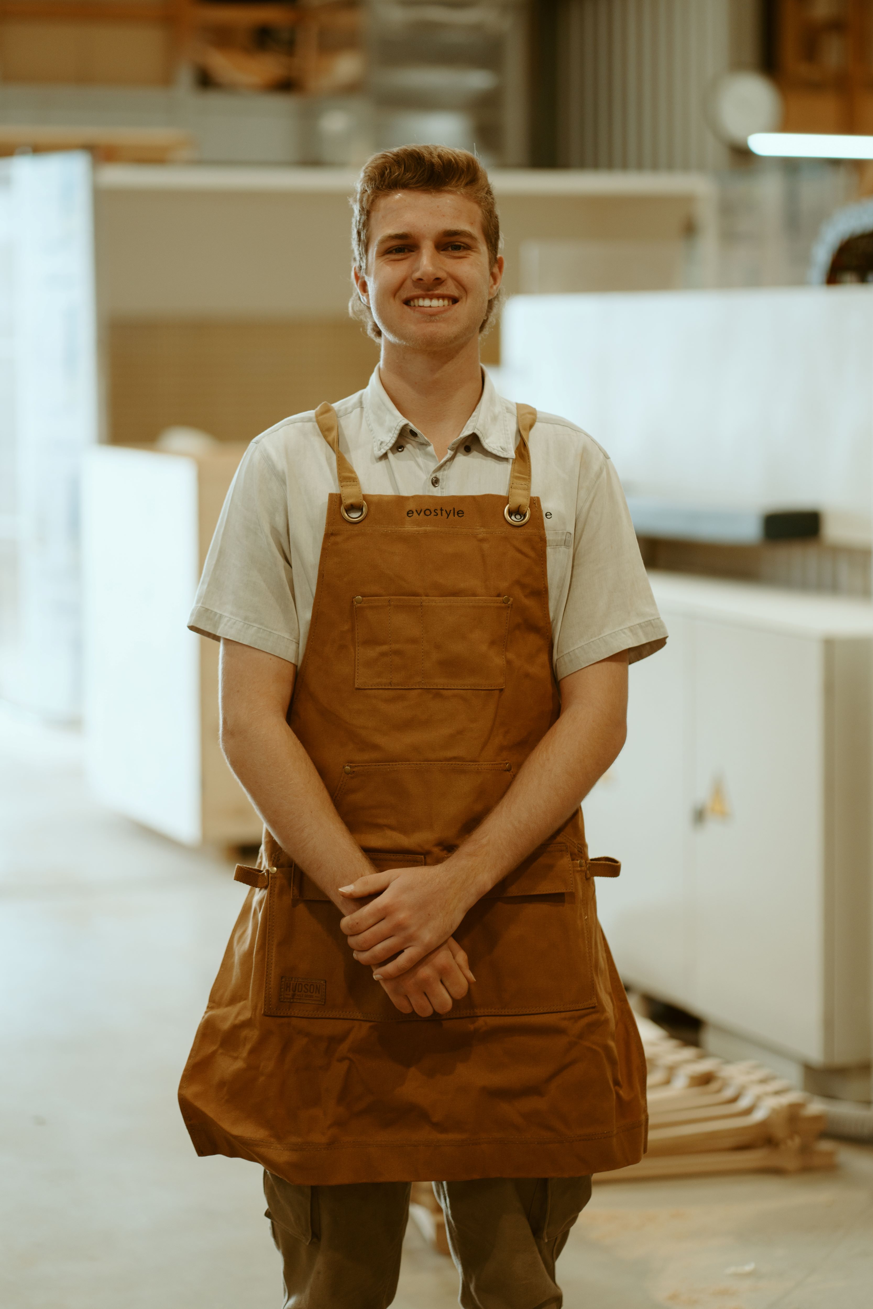 A fast black sports car races down the highway.