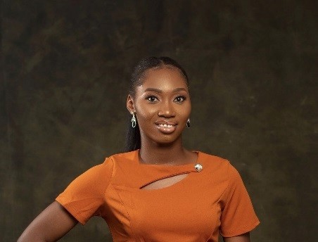 A young girl smiling