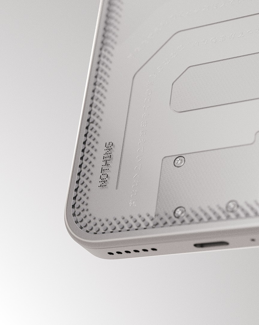 Close-up of lower back panel showcasing etched typography, screws, and corner detailing