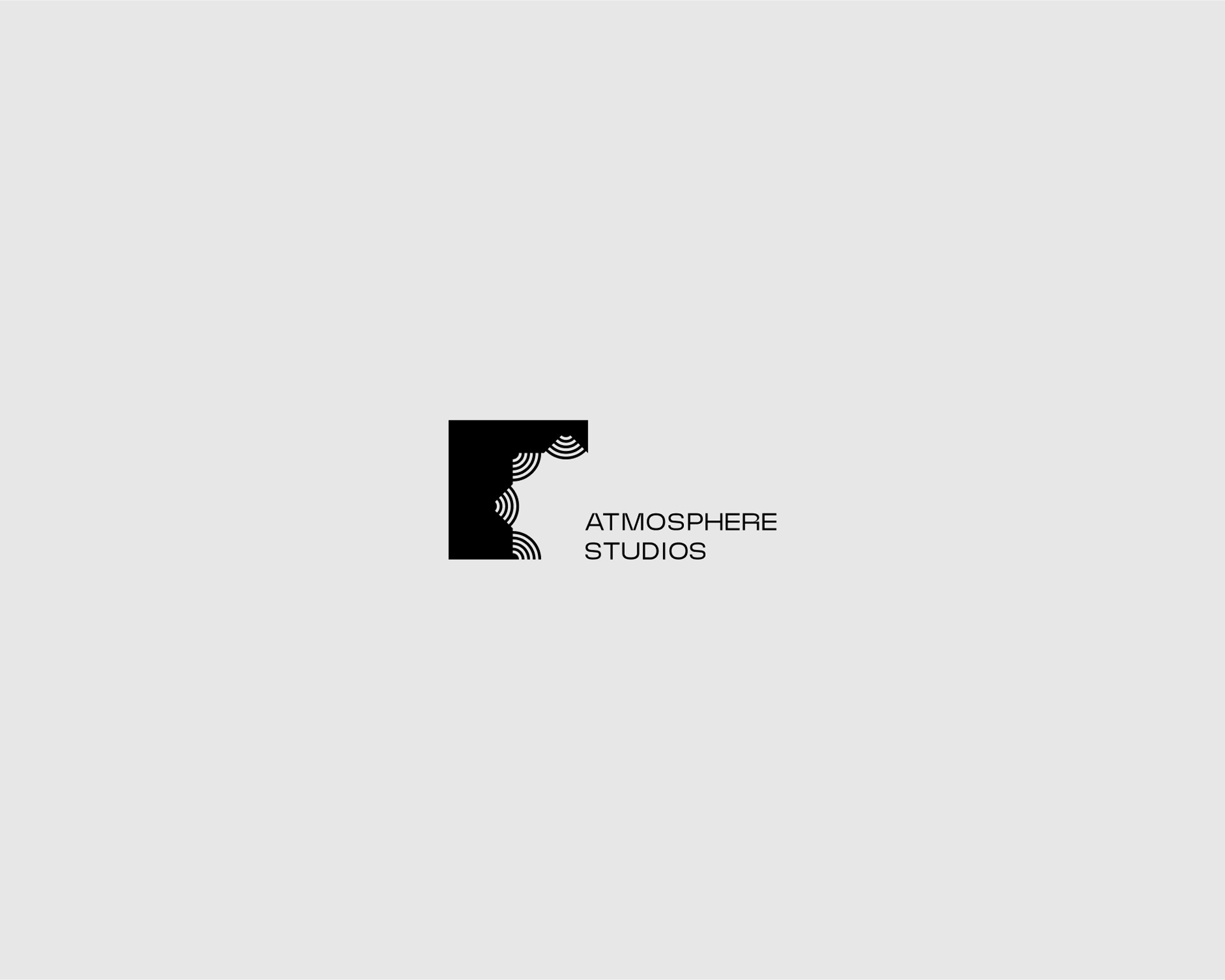 The image features a minimalist black square with curved lines in the top left corner, adjacent to the text "Atmosphere Studios" in a modern, sans-serif font, set against a light gray background.