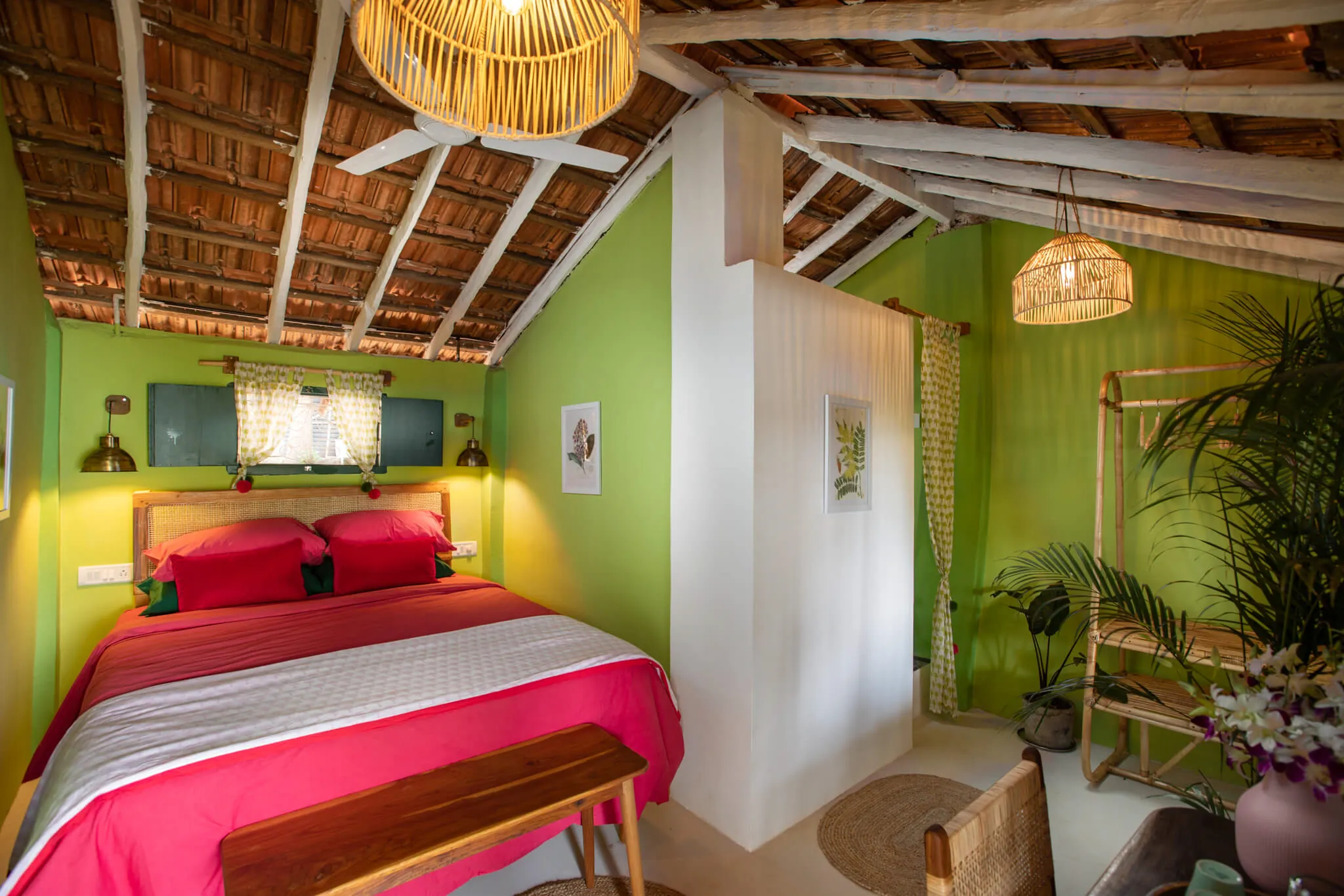 Bright bedroom with pink block-printed bedding at Casa Jaali