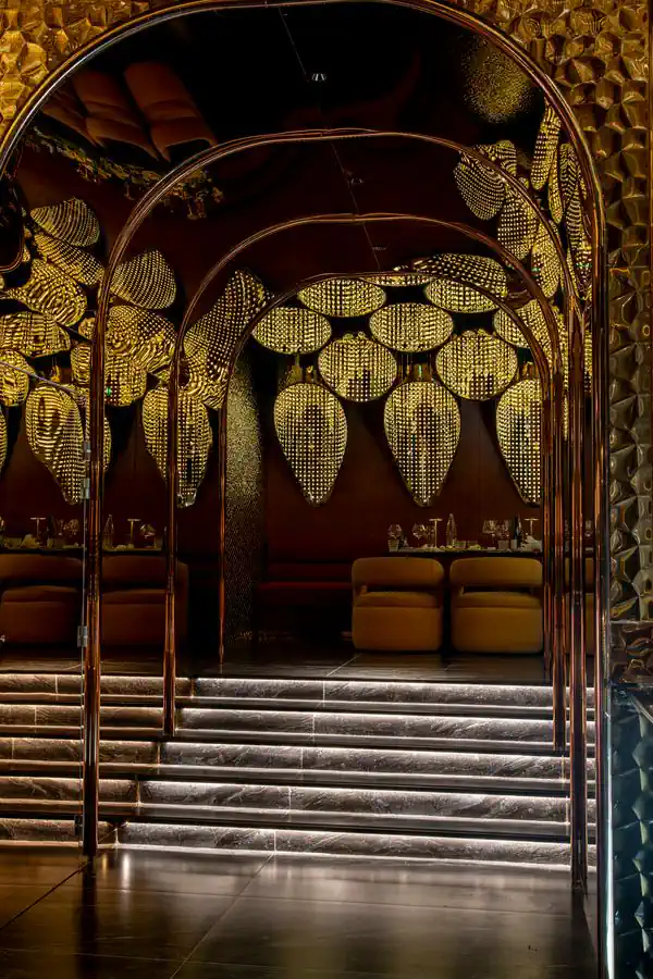 Golden Gallery: glowing gold leaves and a marble staircase
