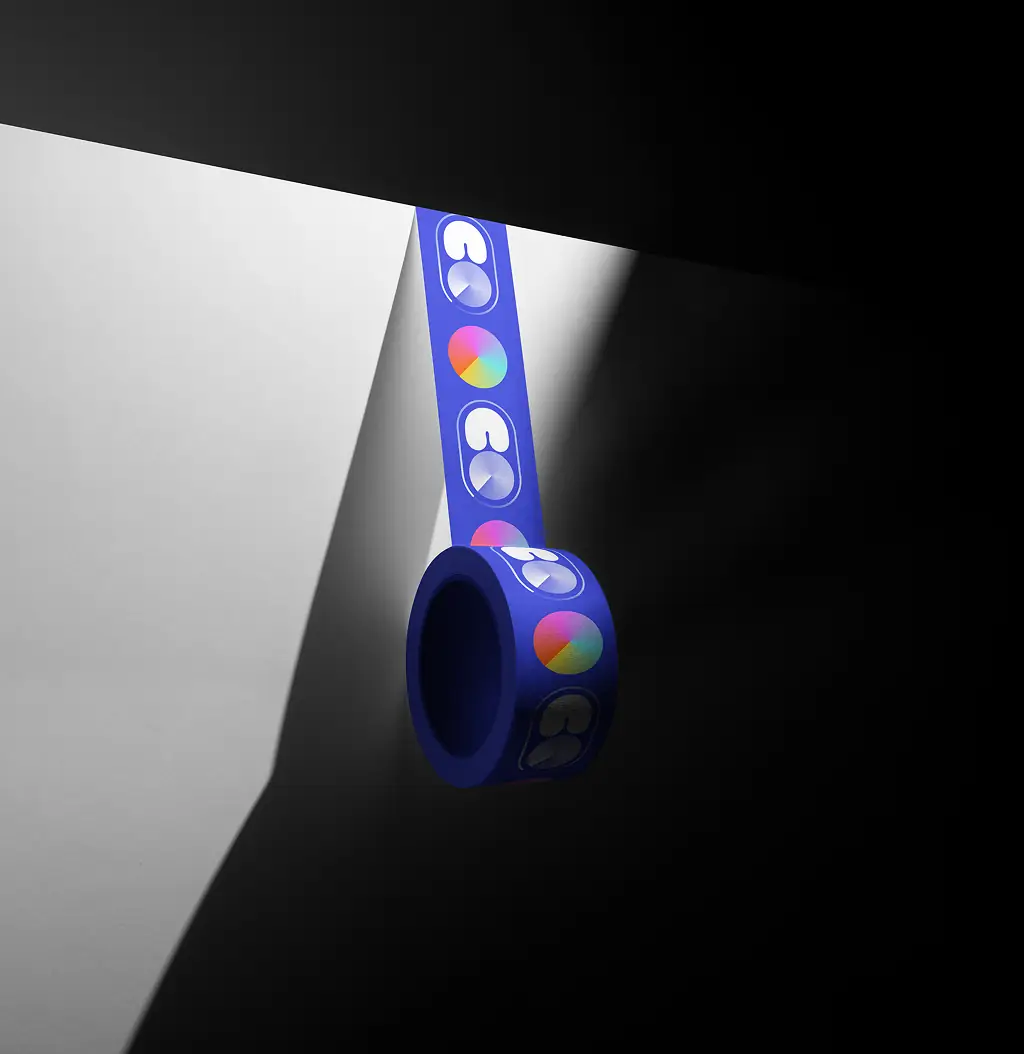 Packaging mockup showing COLORS icons on a tape roll.